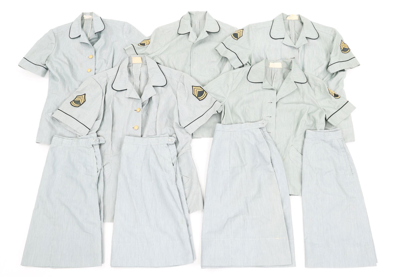 COLD WAR US ARMY WOMAN SUMMER SERVICE DRESS LOT: COLD WAR US ARMY WOMAN SUMMER SERVICE DRESS LOT Cold War US Army Women's Enlisted / NCO, Green & White Stripes Summer Service Dress Uniforms. (5) Tunics. (4) Skirts. Some tunics are missing buttons. S