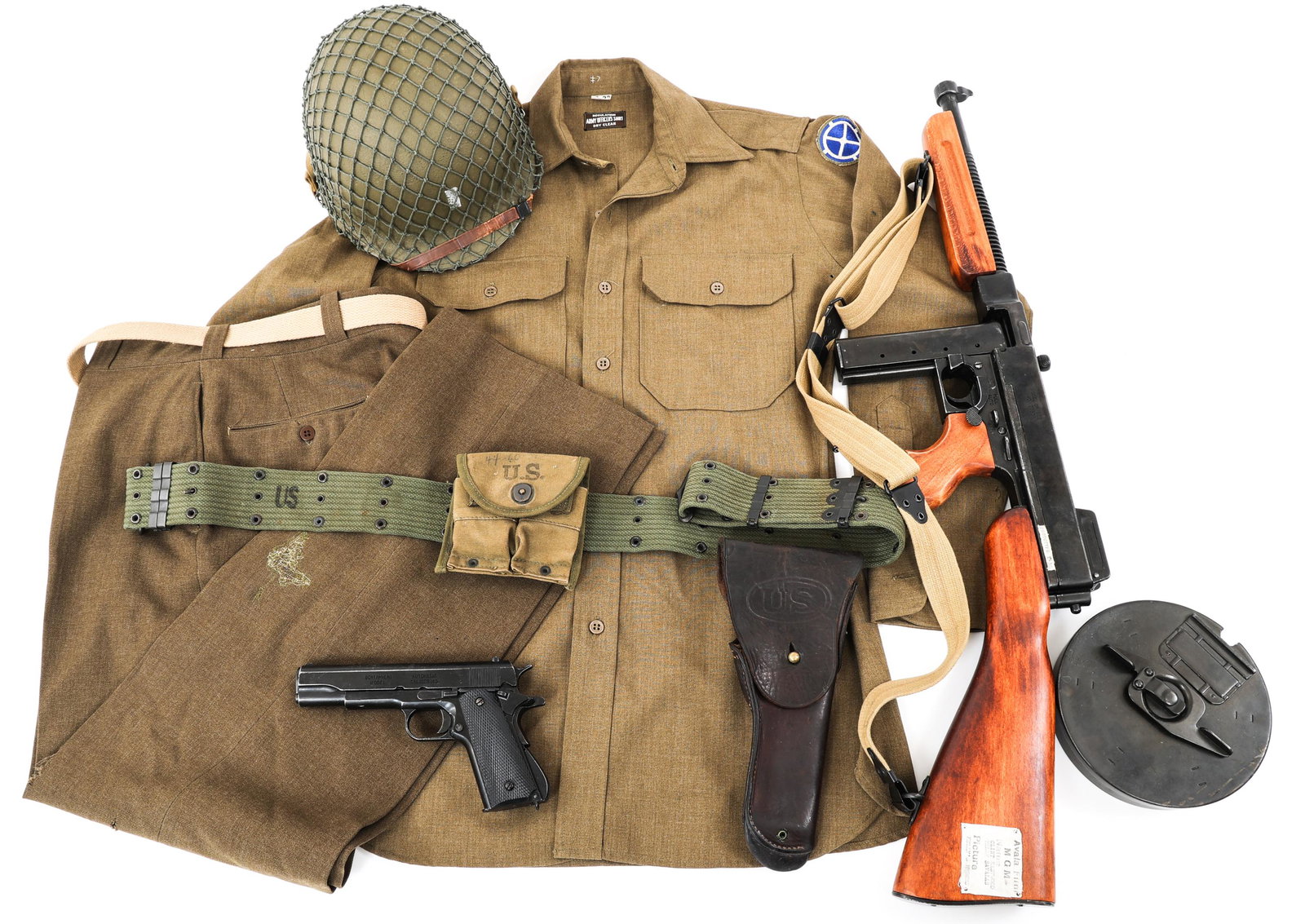 CLINT EASTWOOD KELLY'S HEROES UNIFORM & PROPS: CLINT EASTWOOD KELLY'S HEROES UNIFORM & PROPS Kelly's Heroes (Metro Goldwyn Mayer, 1970) Kelly, played by Clint Eastwood, movie costume uniform and props. Includes shirt, pants, belt, helmet, gun belt