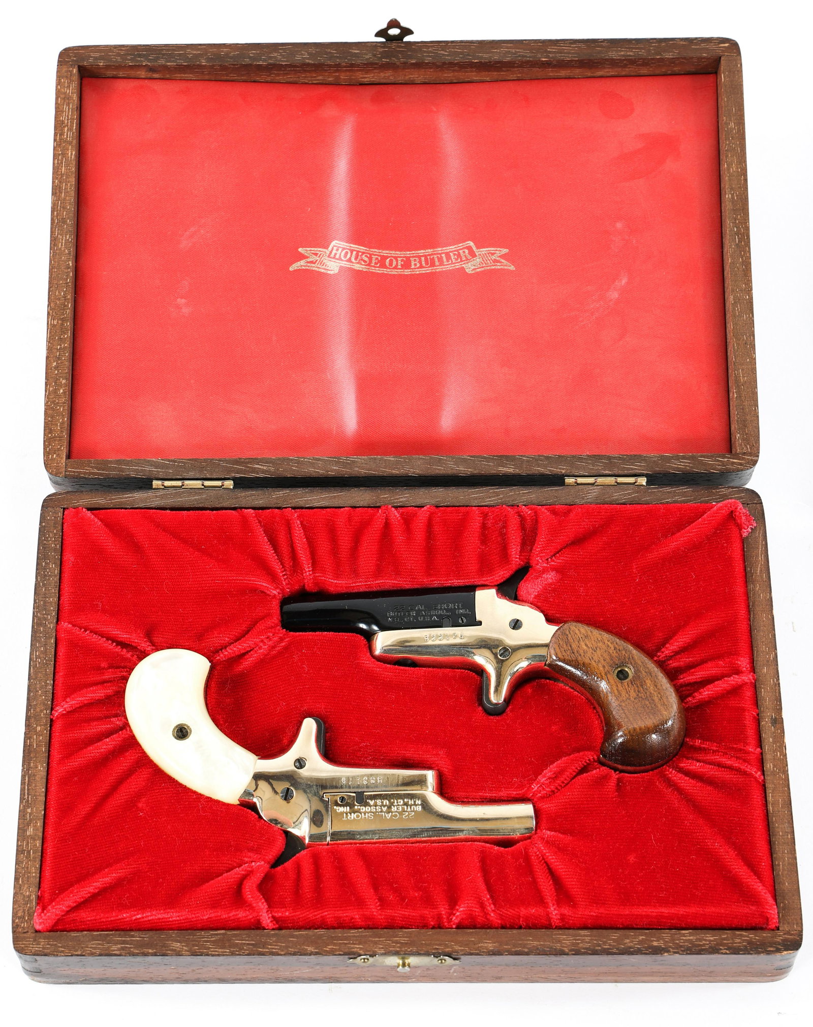 SEQUENTIALLY NUMBERED BUTLER DERRINGER SET OF TWO: SEQUENTIALLY NUMBERED BUTLER DERRINGER SET OF TWO Sequentially numbered Butler Derringer set of two in wooden presentation box. The inside of the box lid is stamped "House of Butler". The tops of the 
