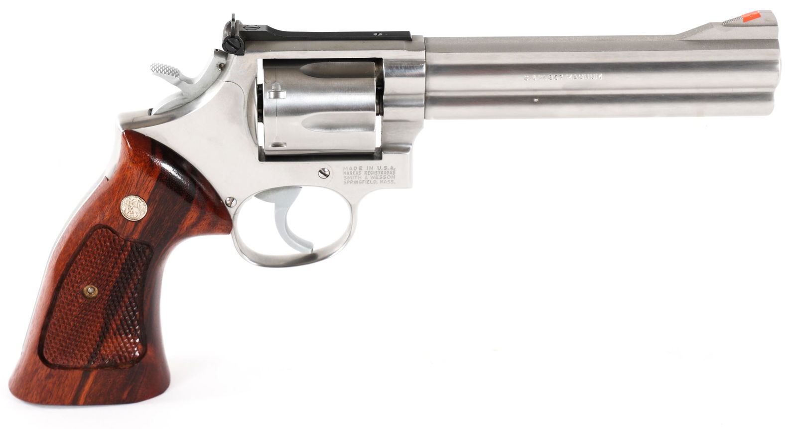SMITH & WESSON MODEL 686 .357 MAGNUM REVOLVER: SMITH & WESSON MODEL 686 .357 MAGNUM REVOLVER Smith and Wesson Model 686 .357 Magnum Revolver. Barrel is stamped "Smith and Wesson" and ".357 Magnum" Stainless steel finish. Oversized checkered walnut