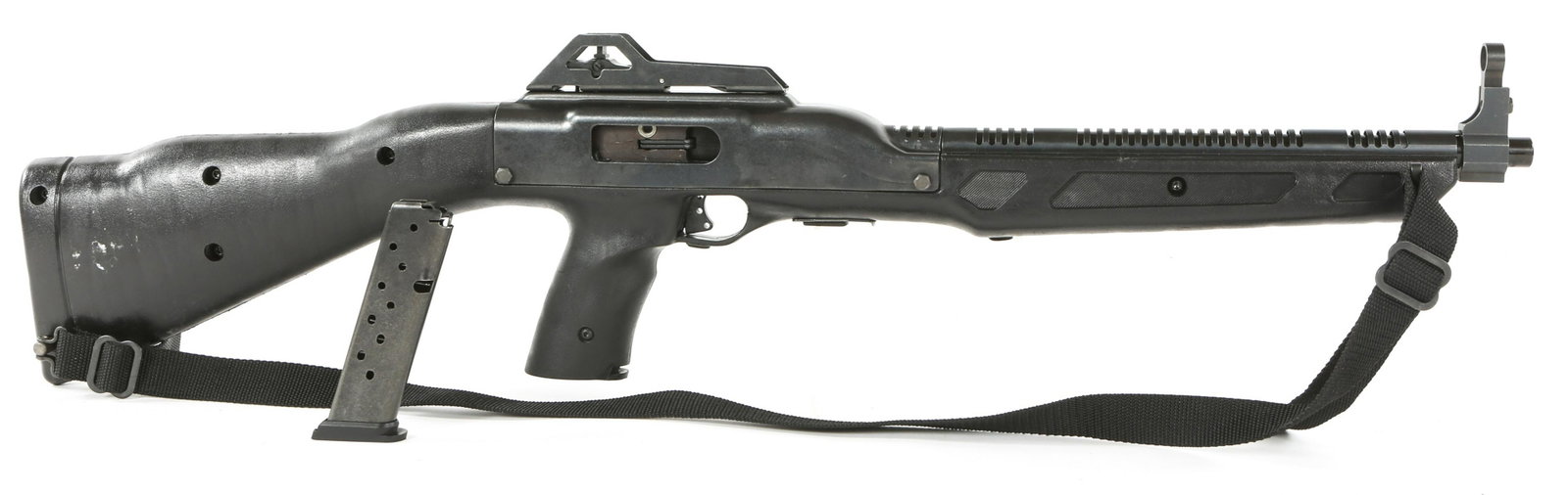 HI-POINT MODEL 995 9X19mm CARBINE: HI-POINT MODEL 995 9X19mm CARBINE Hi-Point Model 995 9x19mm Semi-Automatic Carbine. The receiver is stamped "Hi Point Firearms by Beemiller. Mansfield, Oh. 9x19mm. Model 995". Blued finish. Polymer st