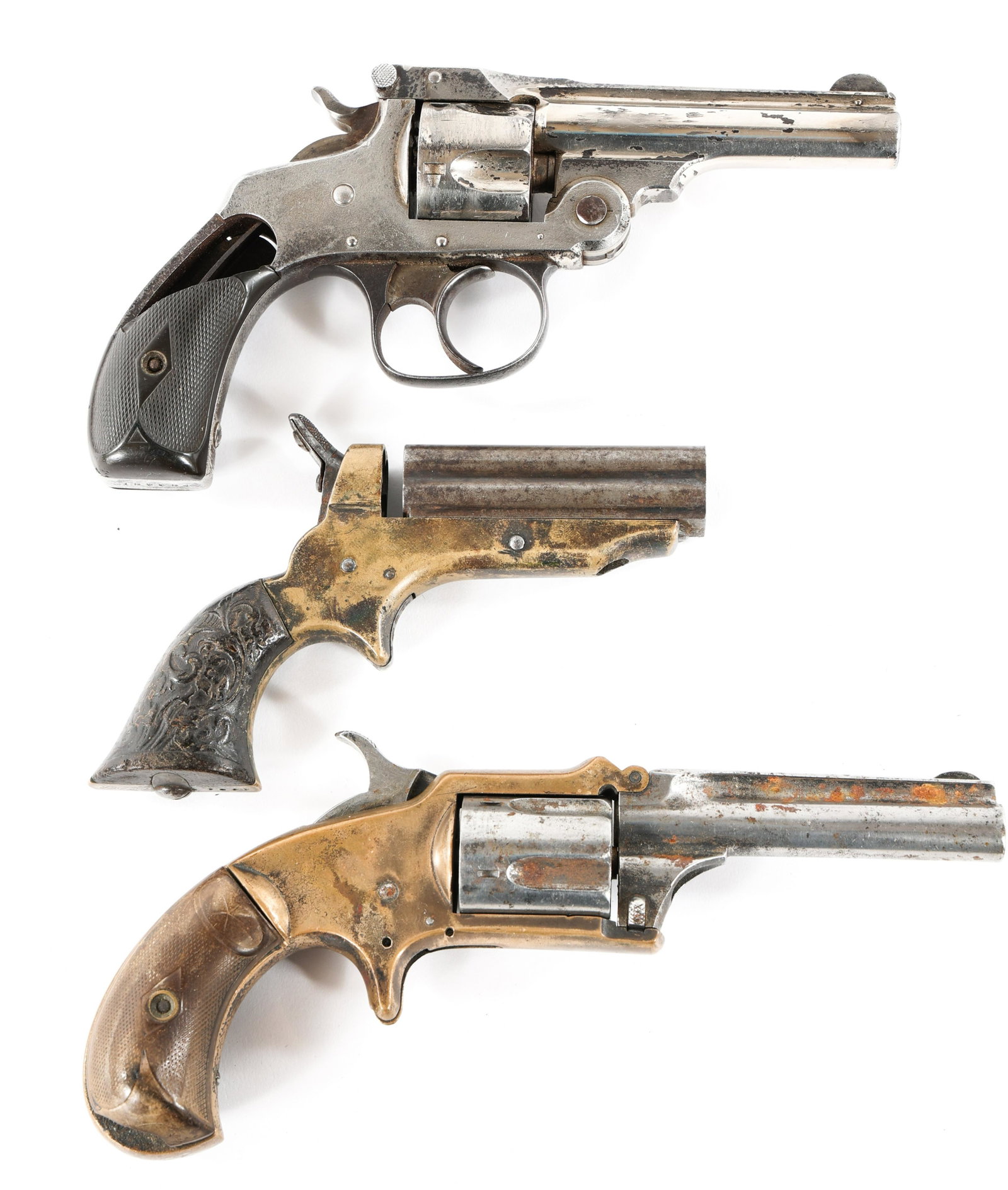 ANTIQUE REVOLVER LOT OF 3: ANTIQUE REVOLVER LOT OF 3 Antique revolver lot of three. Smith & Wesson top break .32 caliber double action. Marlin No. 32 Standard 1875 tip up .32 caliber. C. Sharp's .22 caliber pepperbox. Caliber /