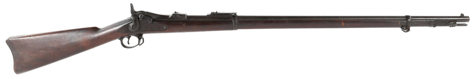 US SPRINGFIELD MODEL 1884 TRAP DOOR RIFLE: US SPRINGFIELD MODEL 1884 TRAP DOOR RIFLE US Springfield Model 1884 .45-70 caliber trap door rifle. US marks and proofs. Stock stamped M 85. Rod bayonet. Blued finish. Walnut stock. Caliber / Gauge: .