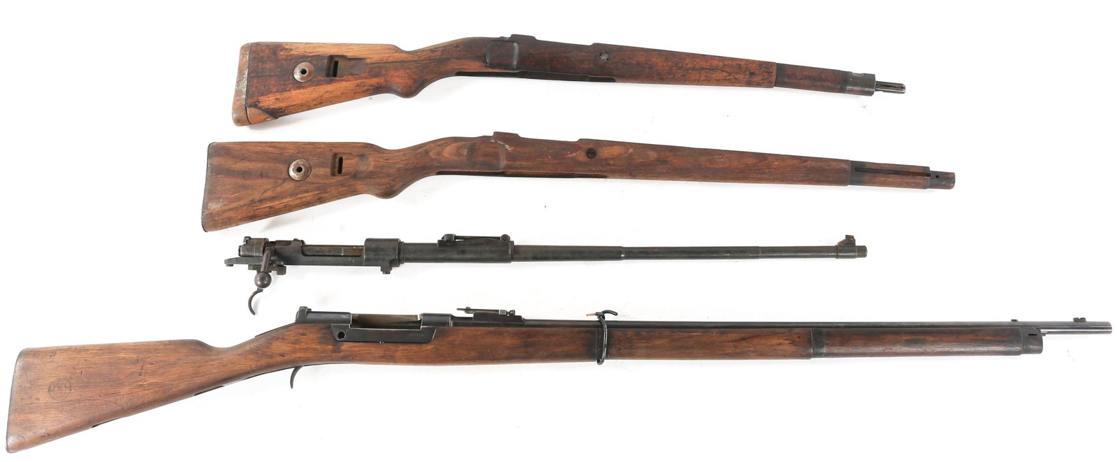 GERMAN MAUSER K.98 RIFLE PARTS LOT: GERMAN MAUSER K.98 RIFLE PARTS LOT Mauser K.98 Parts Lot. One 1940 Mauser K.98 "42" barrel, receiver, and bolt. One K.98 stock. One Steyr Mannlicher 1886 Barrel, receiver, and stock. One mountain carb