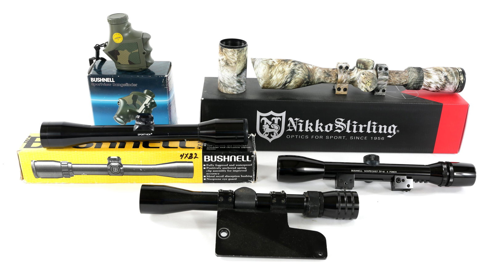 RIFLE SCOPES - BUSHNELL, REDFIELD, NIKKO: RIFLE SCOPES - BUSHNELL, REDFIELD, NIKKO Rifle Scope Lot of Four. Bushnell Scopechief IV-M 4 Power. Redfield 2x-7x Tracker with Mossberg 500 mount. Bushenell Sportview 4x32 Scope with original box. Ni