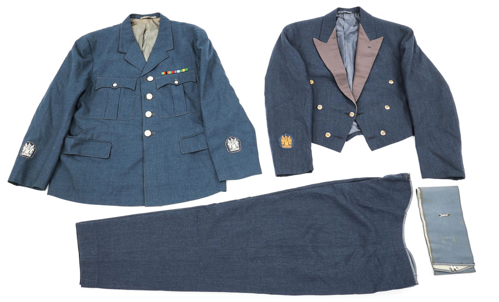 RHODESIAN UDI AIR FORCE WARRANT OFFICER UNIFORMS: RHODESIAN UDI AIR FORCE WARRANT OFFICER UNIFORMS Rhodesian UDI Air force Warrant Officer Uniforms. Includes A Mess dress tunic with trousers and elastic cummerbund, A 4 pockets service dress tunic wit