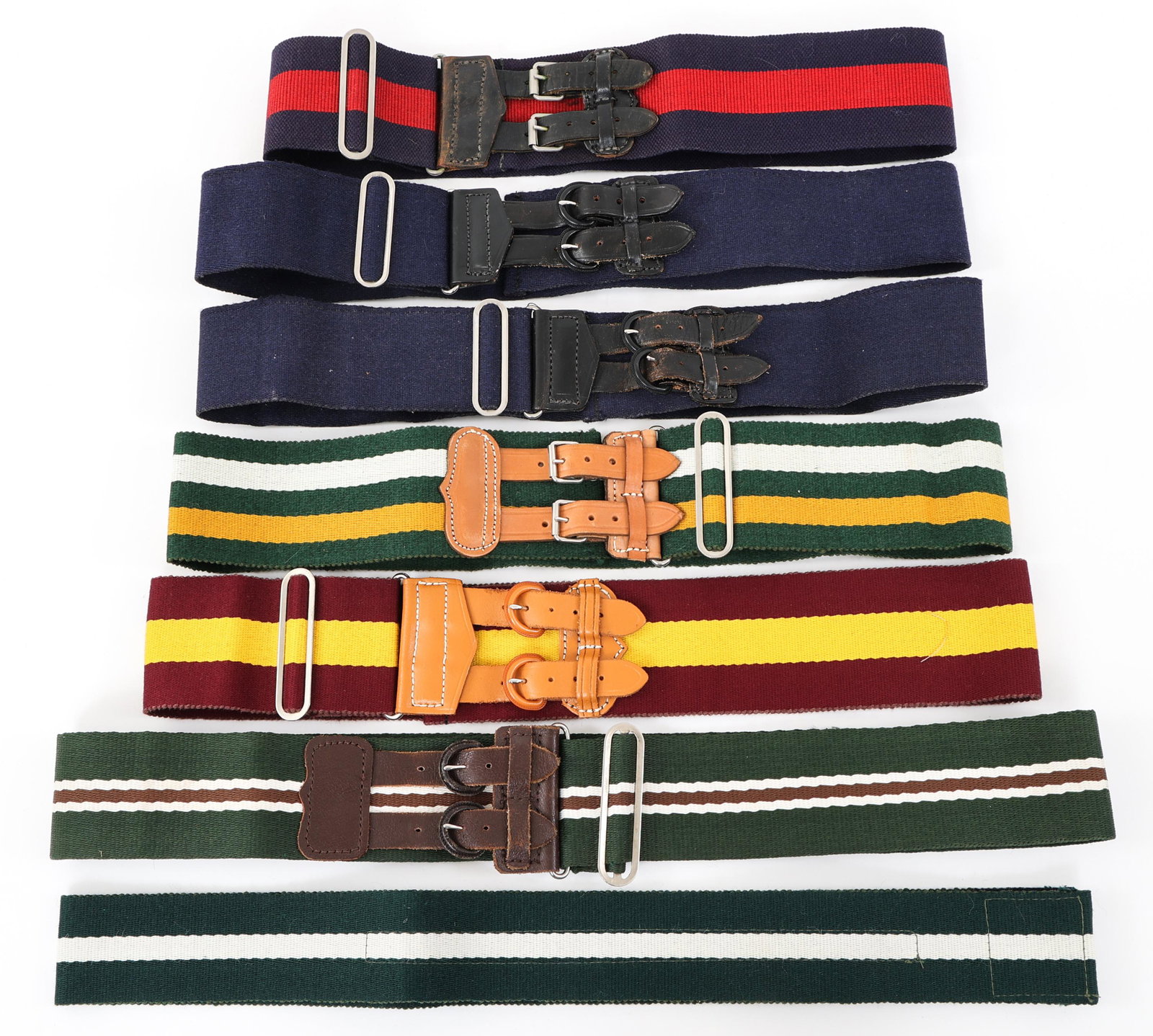 BRITISH ARMY REGIMENTAL STABLE BELT LOT OF 7: BRITISH ARMY REGIMENTAL STABLE BELT LOT OF 7 British Army Regimental Stable Belt, Lot of 7. Provenance | The Dublin Trust Collection: Personal effects of a U.S. Citizen, who arrived in the United Stat