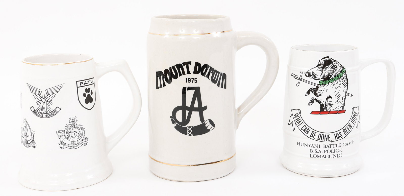 RHODESIAN SECURITY FORCES BEER MUG LOT OF 3: RHODESIAN SECURITY FORCES BEER MUG LOT OF 3 Lot of 3 Rhodesian Security Forces Beer Mugs / steins. (1) Internal Affairs Mount Darwin 1975 Mug. (1) BSA Police "Hunyani Battle Camp" Mug. (1) Rhodesian R