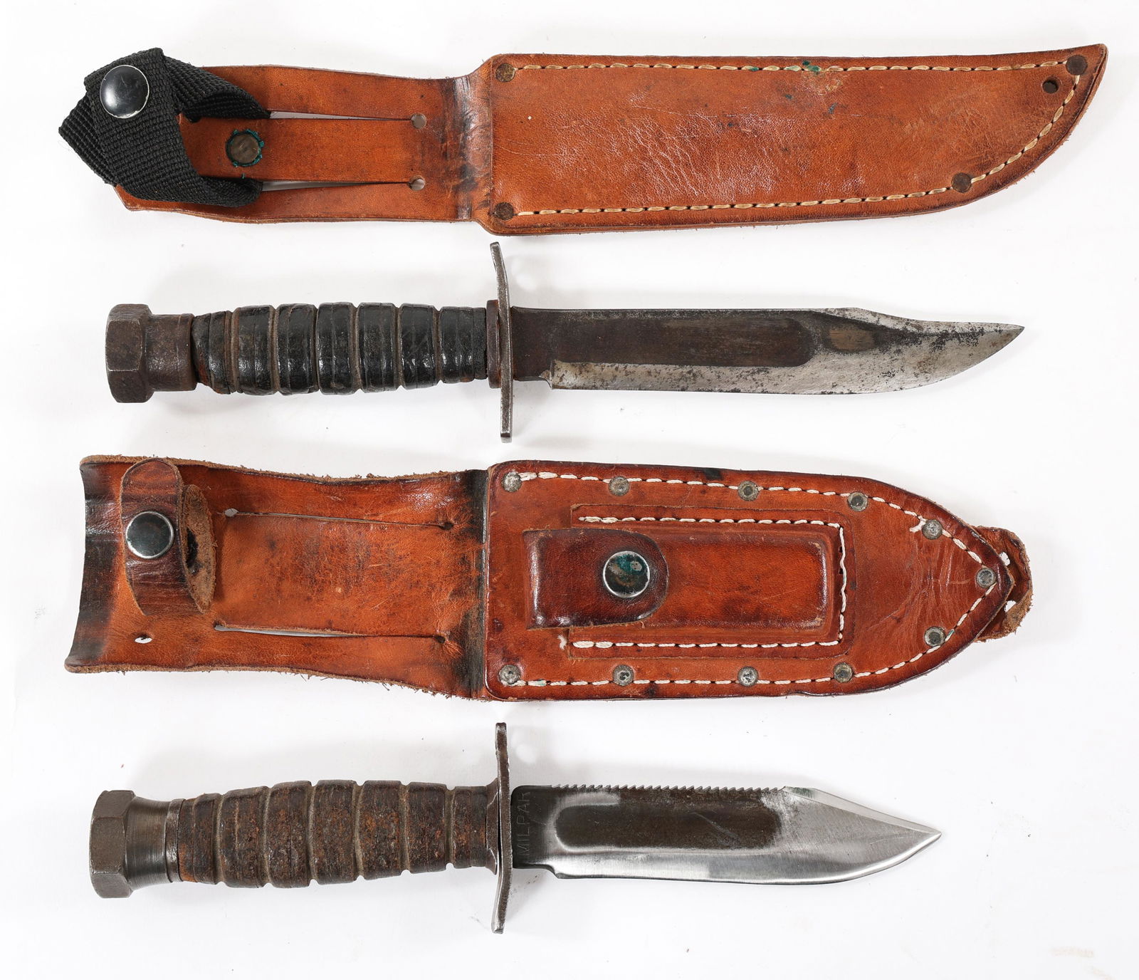 USAF JET PILOT SURVIVAL KNIFE 5" & 6" LOT OF 2: USAF JET PILOT SURVIVAL KNIFE 5" & 6" LOT OF 2 Vietnam War Era, Lot of 2 USAF Survival Knives. (1) Early "Camillus N.Y", 6" Clip point blade with deep fuller to both sides and sawback spine. Stacked l