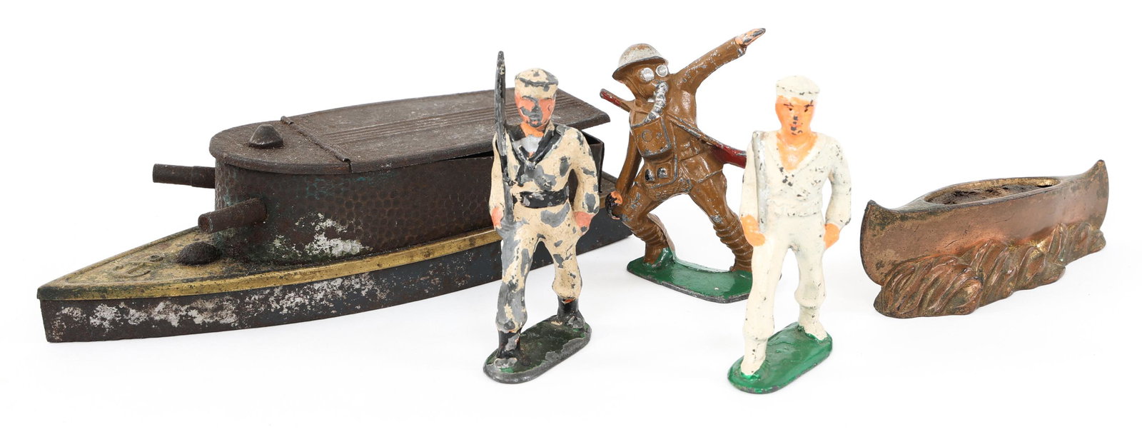 19th C. TO WWII TOY BOATS AND SOLDIER FIGURINES: 19th C. TO WWII TOY BOATS AND SOLDIER FIGURINES 19th C. to WWI toys lot. (1) Civil War tin gun boat, size 7" x 2.5" x 1.5". (1) Brass cast Indian canoe, size 4" x 1". (3) 80mm soldier figure.