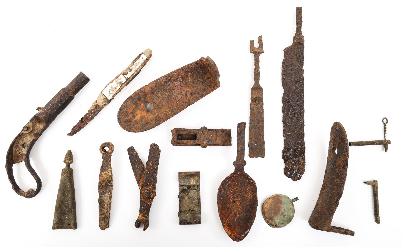 CIVIL WAR EXCAVATED PISTOL FRAME AND OTHERS LOT: CIVIL WAR EXCAVATED PISTOL FRAME AND OTHERS LOT Lot of 17 Civil War Excavated items. (1) Single Shot Boot Pistol Frame. (1) Dinner Spoon without handle. (1) Opened 5” Folding Pocket Knife with pearl