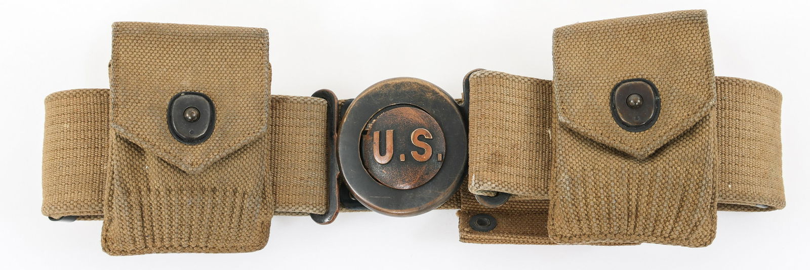 PRE WWI US ARMY M1910 GARRISON BELT By MILLS: PRE WWI US ARMY M1910 GARRISON BELT By MILLS Pre WWI US Army M1910 Garrison Belt With Two Single Clip, Magazine Pouches and Bayonet Slide. Stamped "Mills 1917". Brass interlocking "US" buckle. Size: 3