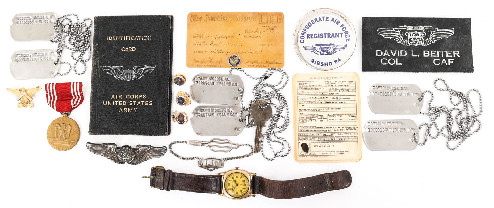 WWII US ARMY AIR FORCE DOGTAGS GROUPING LOT OF 3: WWII US ARMY AIR FORCE DOGTAGS GROUPING LOT OF 3 Lot of 3 WWII US Army Air Force Grouping. (1) WWII AAF Navigator; AAF ID card holder, Good Conduct Medal & dogtags named to "James Foster Jr", 3" Navig