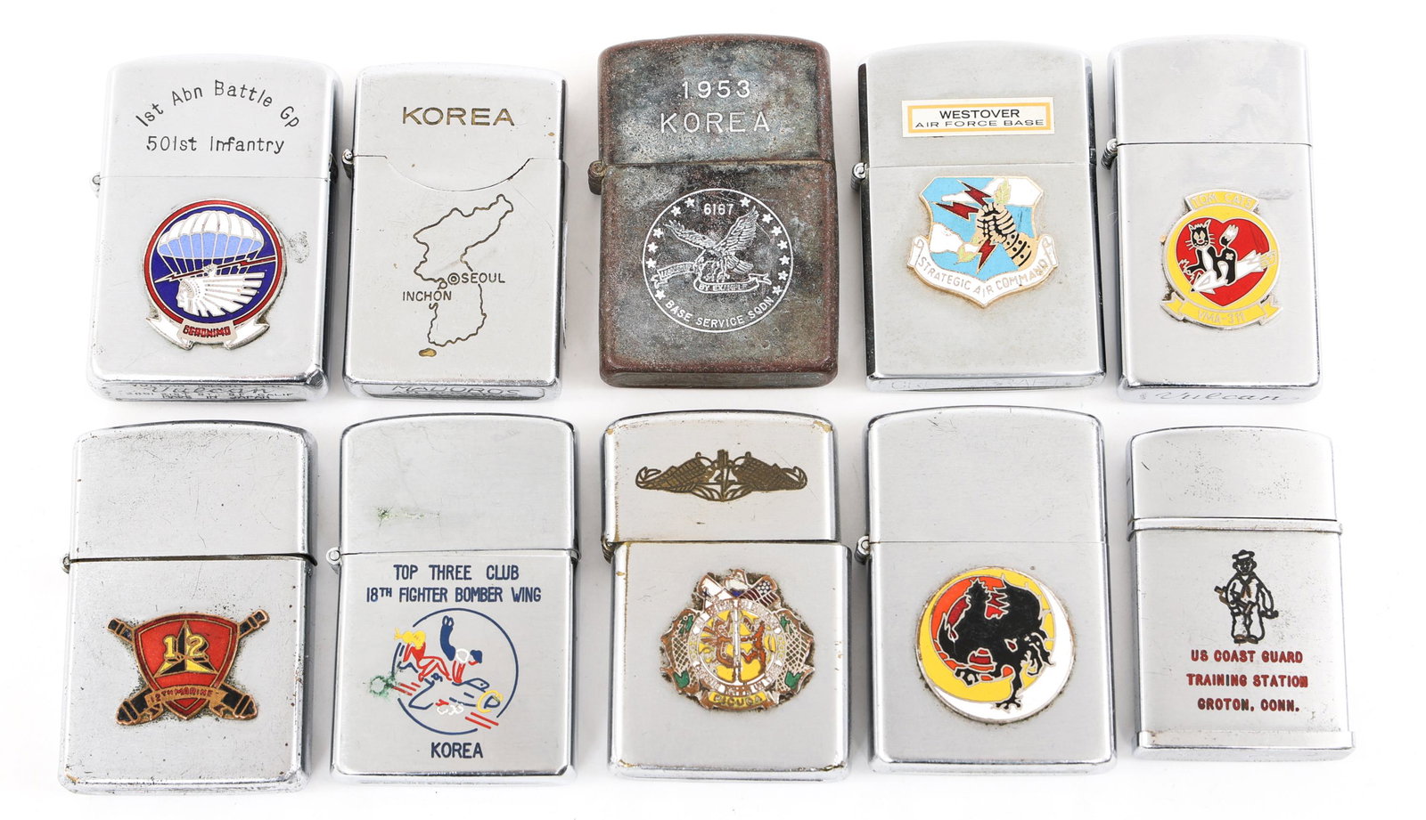 COLD WAR MILITARY ENGRAVED ZIPPO LIGHTER LOT OF 10: COLD WAR MILITARY ENGRAVED ZIPPO LIGHTER LOT OF 10 Lot of 10 Cold War Era US Armed Forces engraved Lighters. Mixed lot of Zippo, Vulcan, Prince, Madoros, Crest-Craft, Penguin, Beta and Longines. Vario