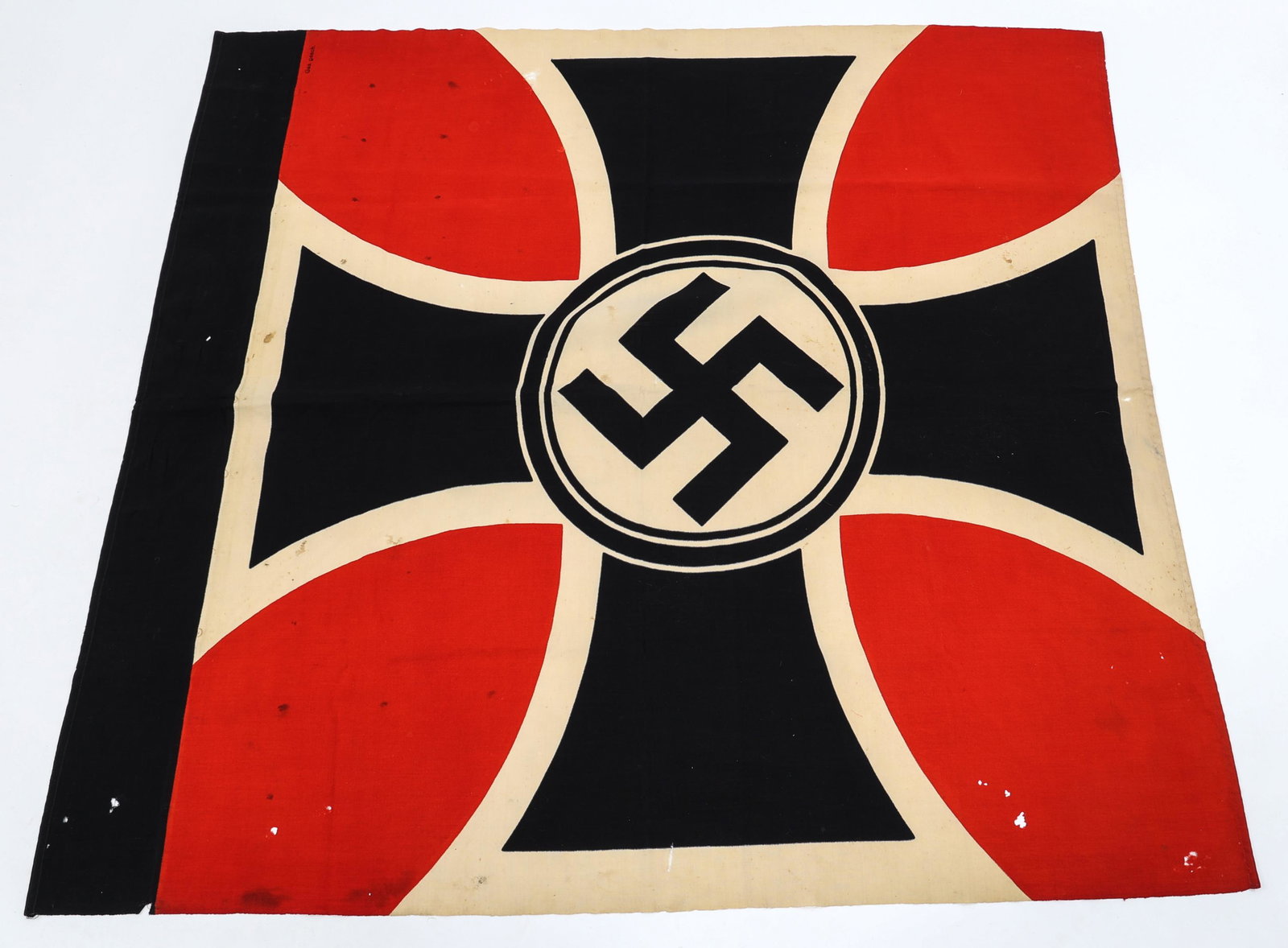 WWII GERMAN VETERANS ASSOCIATION FLAG: WWII GERMAN VETERANS ASSOCIATION FLAG German World War II Veterans Association Swastika Flag. Measures 48” wide by 52” tall. The flag shows a swastika in the center of a Maltese cross. One piece p