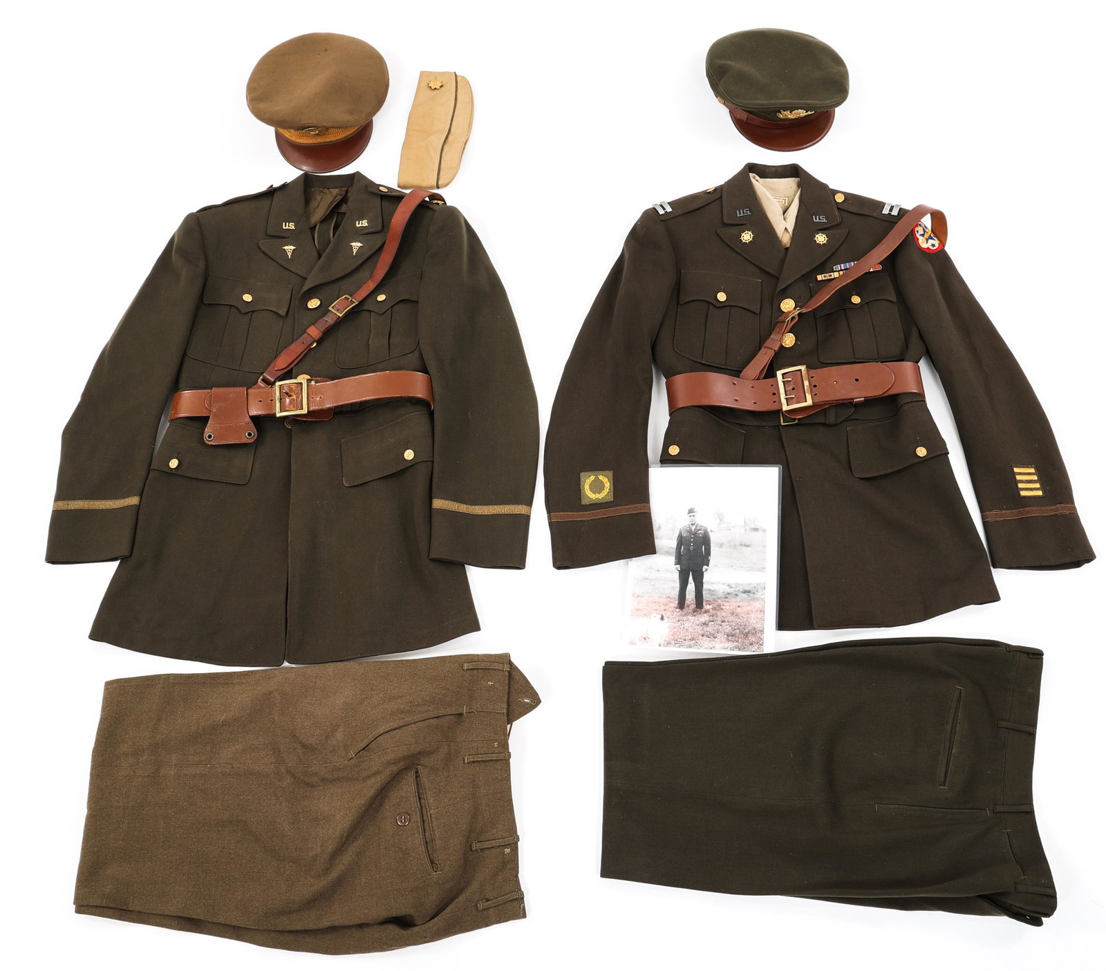 WWII US ARMY OFFICER DRESS UNIFORM LOT OF 2: WWII US ARMY OFFICER DRESS UNIFORM LOT OF 2 Lot of 2 WWII US Army Officer Dress Uniforms. (1) WWII US Army Transportation Corps Officer uniform. Identified to captain "Edward D. McGlynn, attached to t
