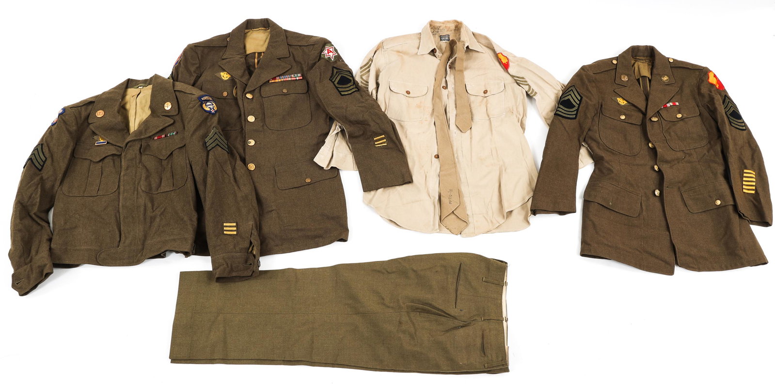 WWII US ARMY NCO'S DRESS UNIFORM LOT: WWII US ARMY NCO'S DRESS UNIFORM LOT WWII US Army Dress Uniforms. (1) 9th AAF, Airborne troop carrier, Sergeant Ike jacket with collar, patches and ribbons. Size 38R, dated 44. (1) Puerto Rican dept, 
