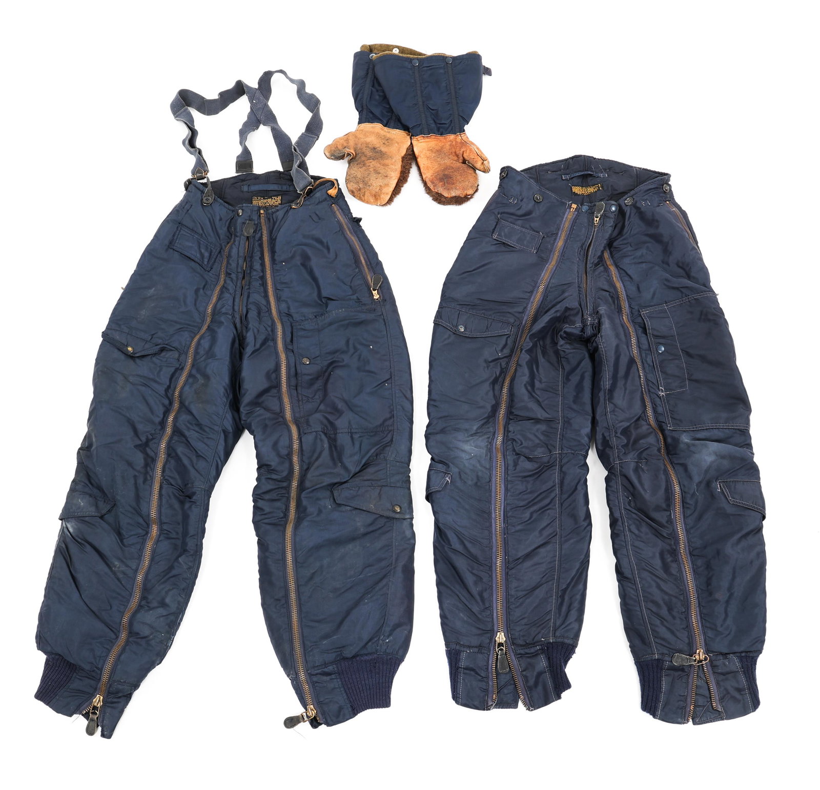 KOREAN WAR USAF FLIGHT TROUSERS AND GLOVES: KOREAN WAR USAF FLIGHT TROUSERS AND GLOVES Korea War USAF Blue Flight Trousers and gloves. (1) Type A-11C, size 30. (1) Type D-1A, size 28. (1) Pair of gloves with liner. Type N-4A, size medium.