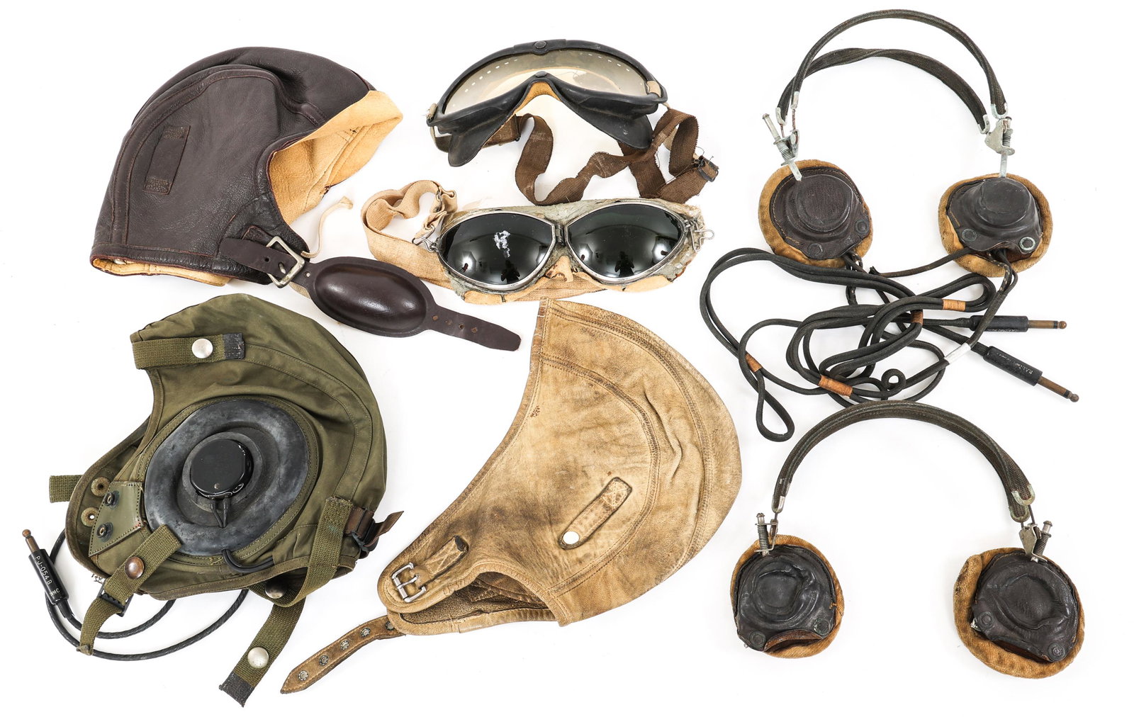 WWII US NAVY FLIGHT HELMET & HEADSET RECEIVER: WWII US NAVY FLIGHT HELMET & HEADSET RECEIVER WWII US Navy Pilot Headgear & Headsets lot. (1) NAF 1092 leather flight helmet, size 7.1/8. (1) White leather flight helmet. (1) Green nylon summer flight
