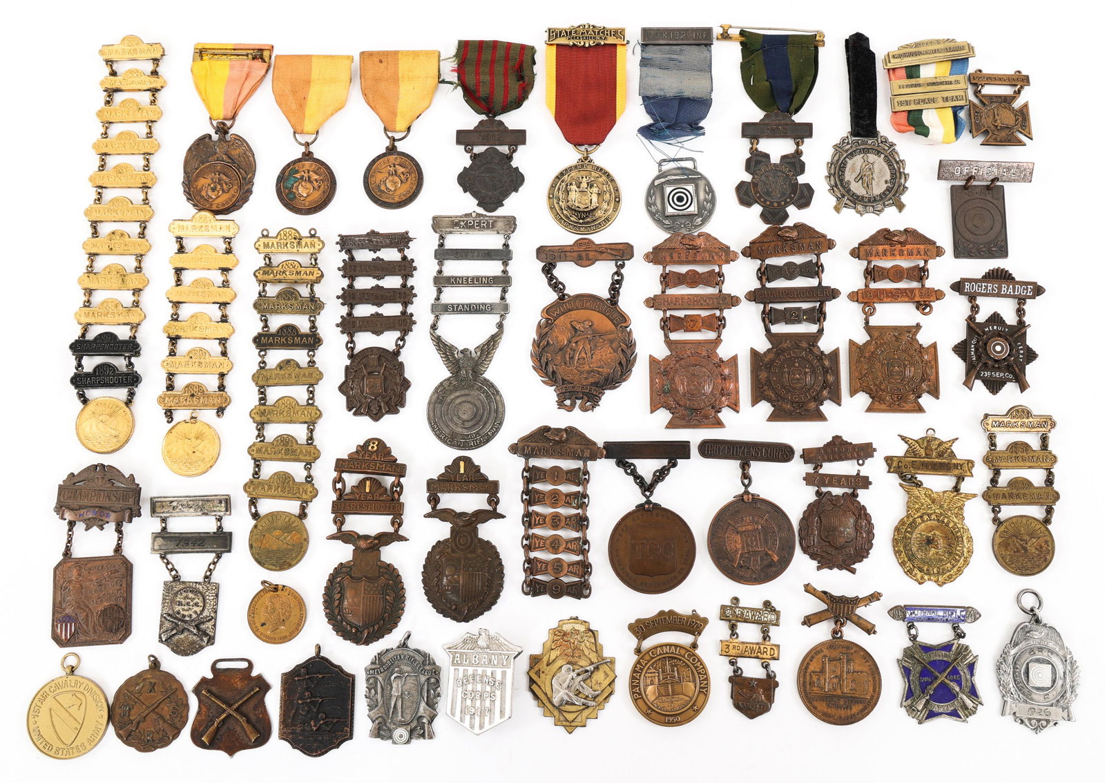 19th C. US ARMY MARKSMAN BADGES MAKER MARKED: 19th C. US ARMY MARKSMAN BADGES MAKER MARKED Spanish American War to WWI US Army and National Guard Marksman Badges Lot. Various states and maker marks, Tiffany & Co, Rich & Oliver Bloomfield N.Y, Bra