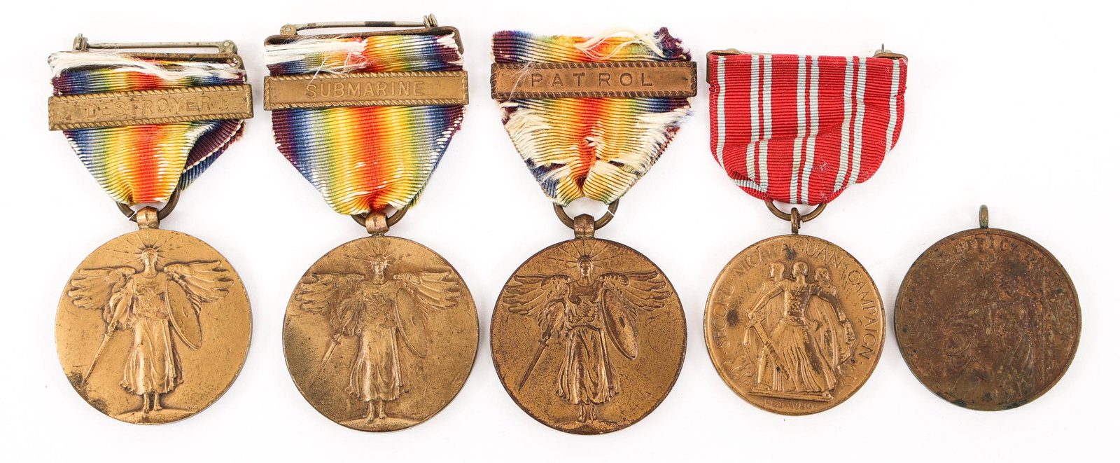 US NAVY NICARAGUA - CUBAN & VICTORY MEDALS LOT: US NAVY NICARAGUA - CUBAN & VICTORY MEDALS LOT WWI US Navy Service & Victory Medals lot. (1) Cuban Pacification 1908, Service Medal (Unnumbered). (1) Second Nicaraguan Campaign Service medal, serial n