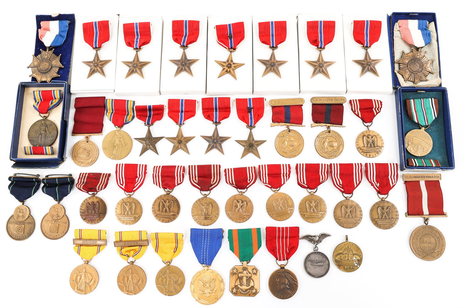 WWII US ARMED FORCES DECORATION & AWARD MEDAL LOT: WWII US ARMED FORCES DECORATION & AWARD MEDAL LOT Lot of Approx. 40 WWII - Korea US Armed Forces decorations and Awards. Including; Bronze Star, Army - USMC and Navy Good conduct, Victory, freedom Med
