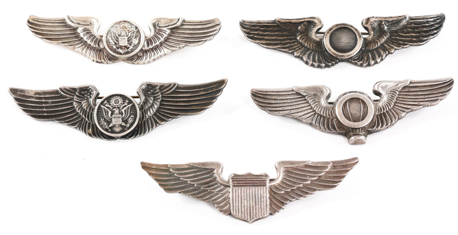 WWII US ARMY AIR FORCE 3" QUALIFICATION WINGS: WWII US ARMY AIR FORCE 3" QUALIFICATION WINGS Lot of 5 WWII US Army Air Force 3" Qualification Wings Insignia. (1) 1930's Snowflakes, pinback Sterling Pilot wings. (1) 3" Balloon Observer "Meyer", Ste