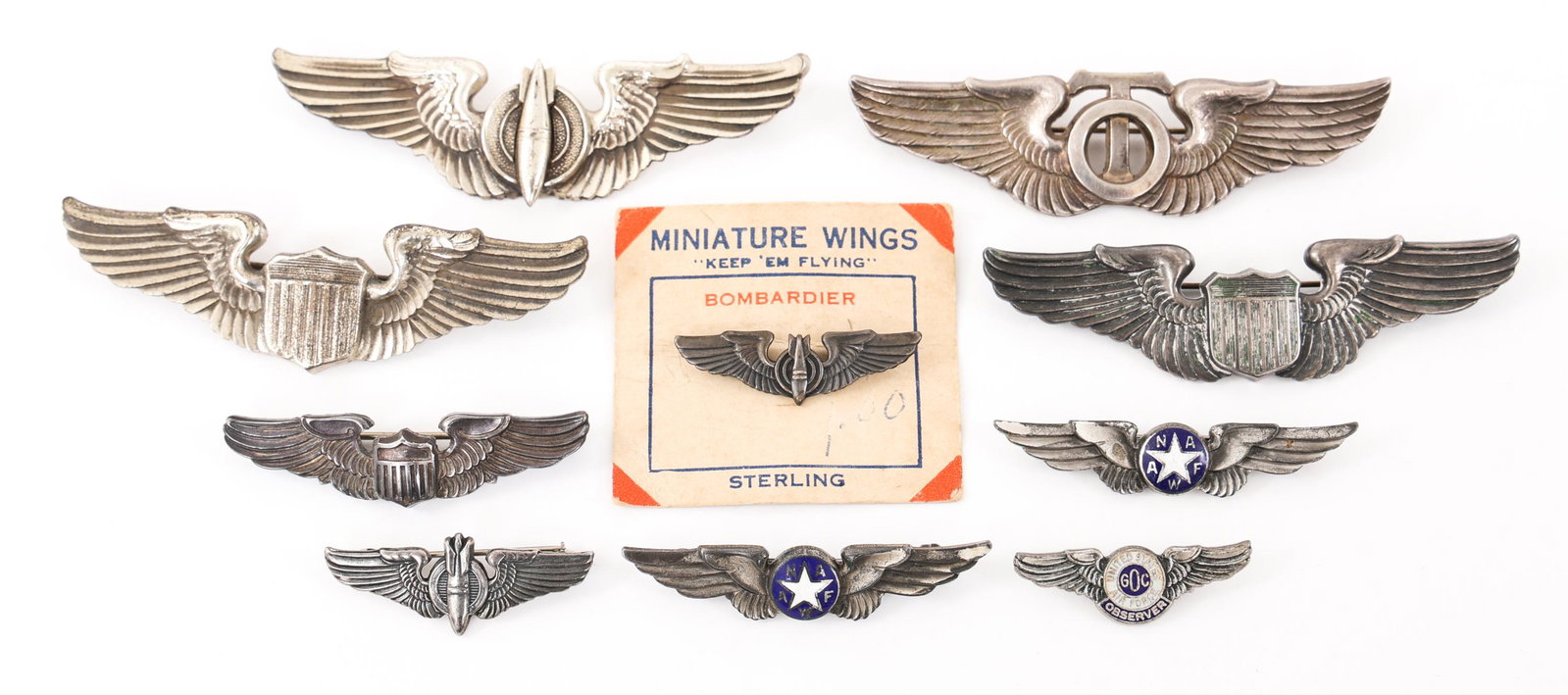WWII US AAF QUALIFICATION WINGS LOT OF 10: WWII US AAF QUALIFICATION WINGS LOT OF 10 Lot of 10 WWII US Army Air Force qualification wings insignia. (1) AAF Technical Observer 3" pinback wings, NS Meyer Shield logo. (1) AAF Bombardier 3" Amcraf