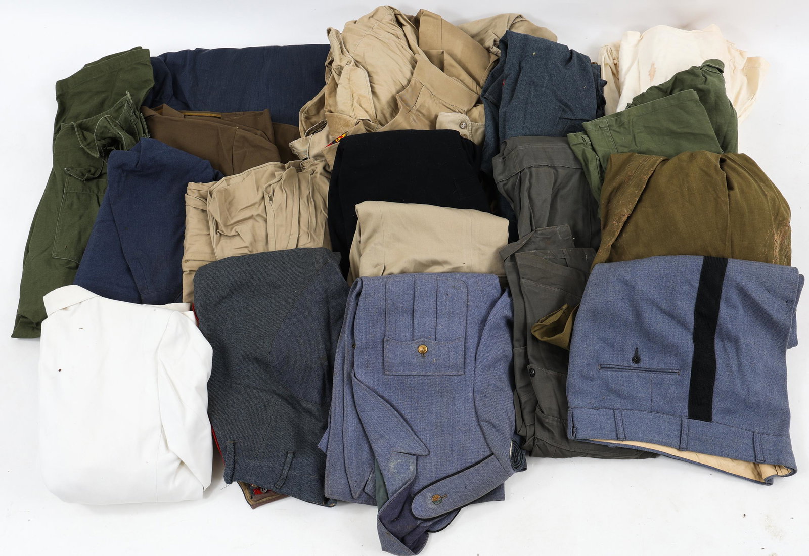 WWII - COLD WAR MILITARY UNIFORMS BONANZA LOT: WWII - COLD WAR MILITARY UNIFORMS BONANZA LOT Large lot of WWII - Cold War Military Uniforms Bonanza Lot. Various Branches and Countries. Shirts, Tunics, Pants and more. Over 30 Lbs. Size: S - M - L
