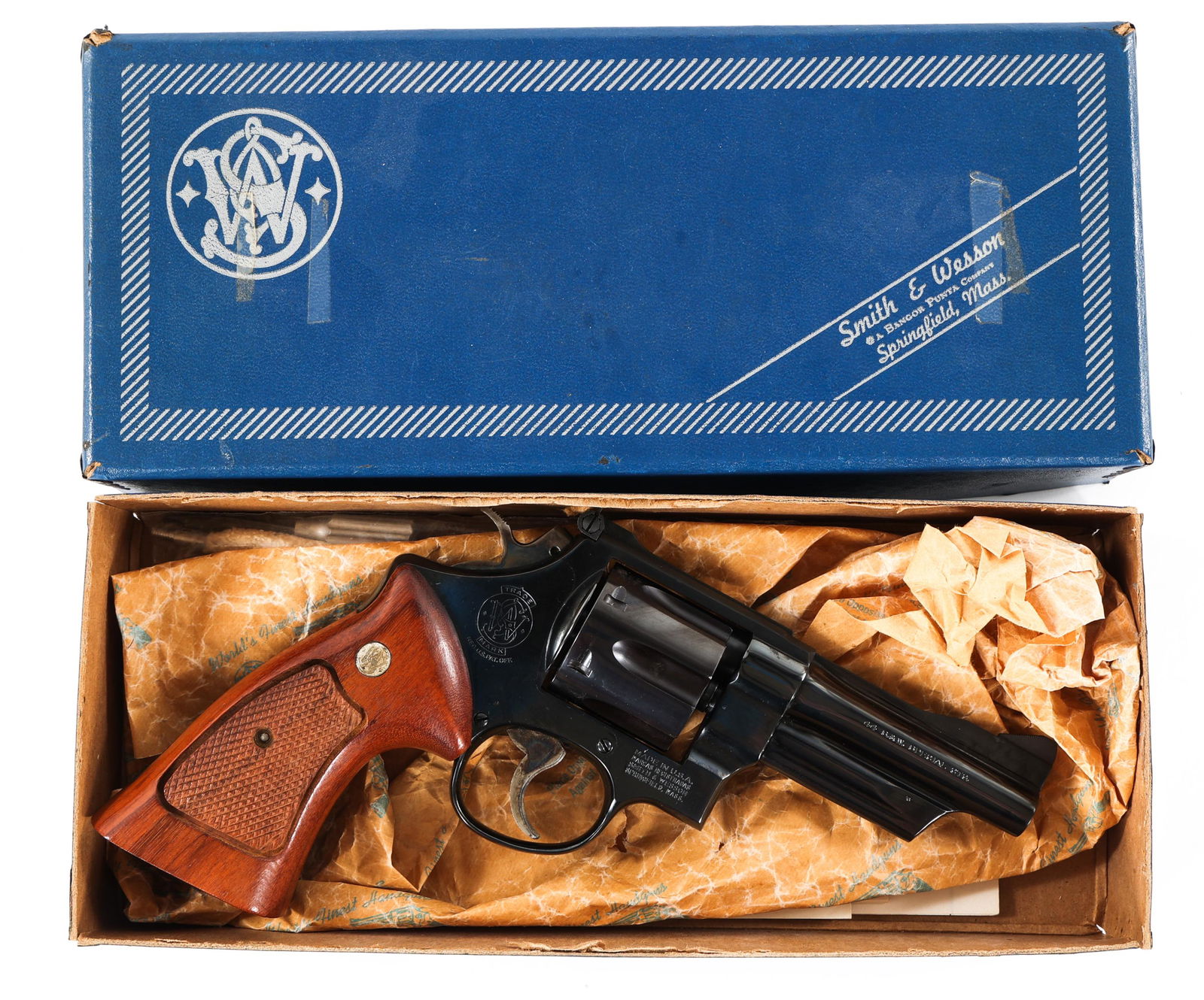 SMITH & WESSON MODEL 24-3 .44 S&W SPECIAL REVOLVER: SMITH & WESSON MODEL 24-3 .44 S&W SPECIAL REVOLVER Smith & Wesson Model 24-3 .44 S&W Special caliber target revolver. Double action. Blued frame, walnut grips with checkering and S&W inlay. Front serr