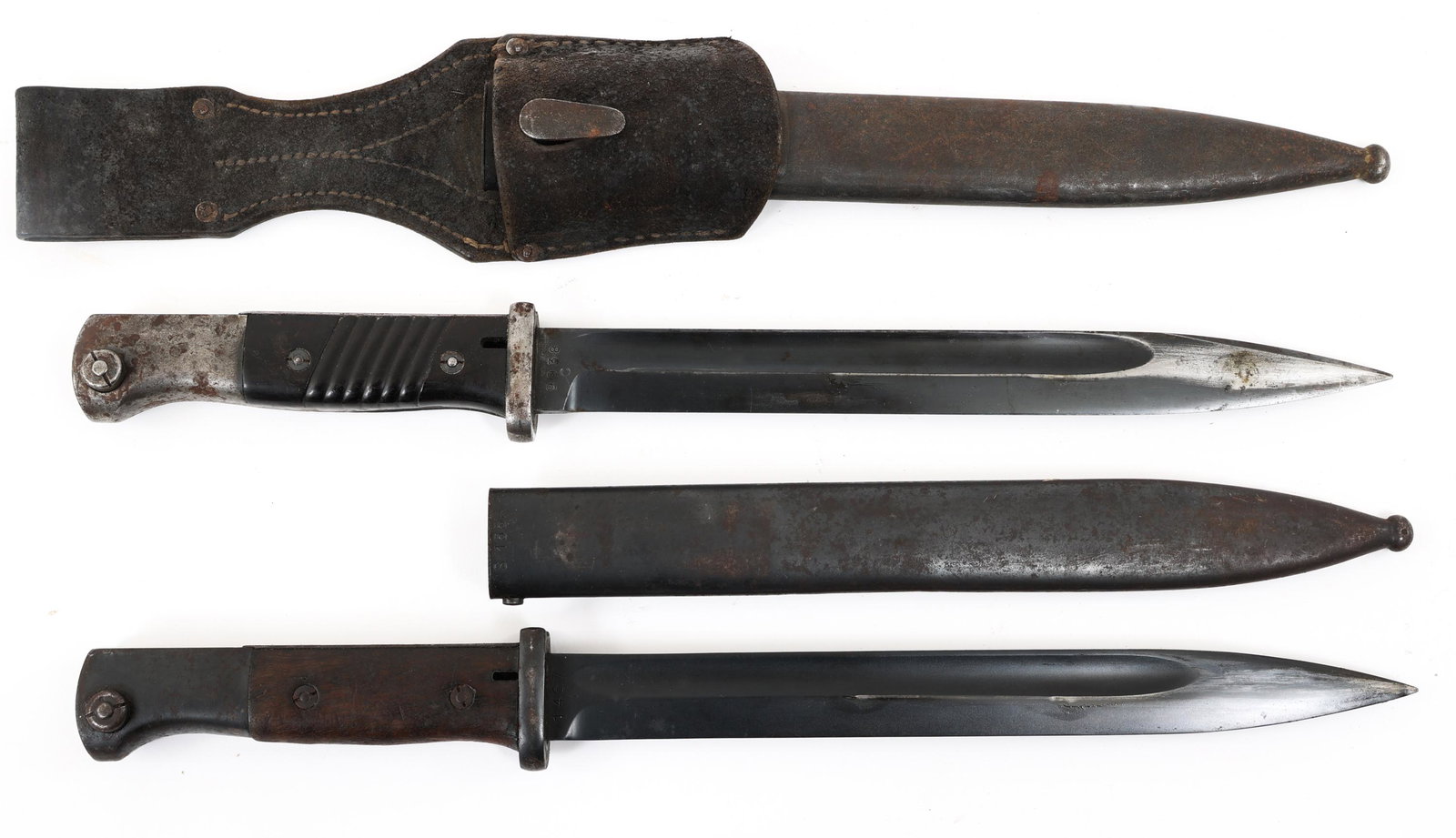 WWII GERMAN K98 COMBAT BAYONET LOT OF 2: WWII GERMAN K98 COMBAT BAYONET LOT OF 2 | Lot of 2 WWII German K98 Combat Bayonets. (1) K98 Combat Bayonet with "1467" matching serial number and maker mark on the scabbard. Spear point, blued blade. 
