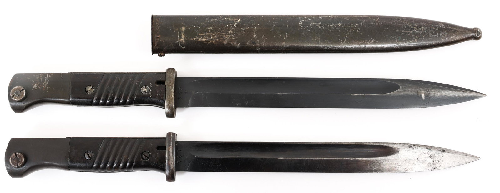 WWII GERMAN K98 COMBAT BAYONET LOT OF 2: WWII GERMAN K98 COMBAT BAYONET LOT OF 2 | Lot of 2 WWII German K98 Combat Bayonets. (1) Spear point, blued blade with fuller. Stamped "42.cul" on one side of the ricasso and "364 i" on the other. Bake