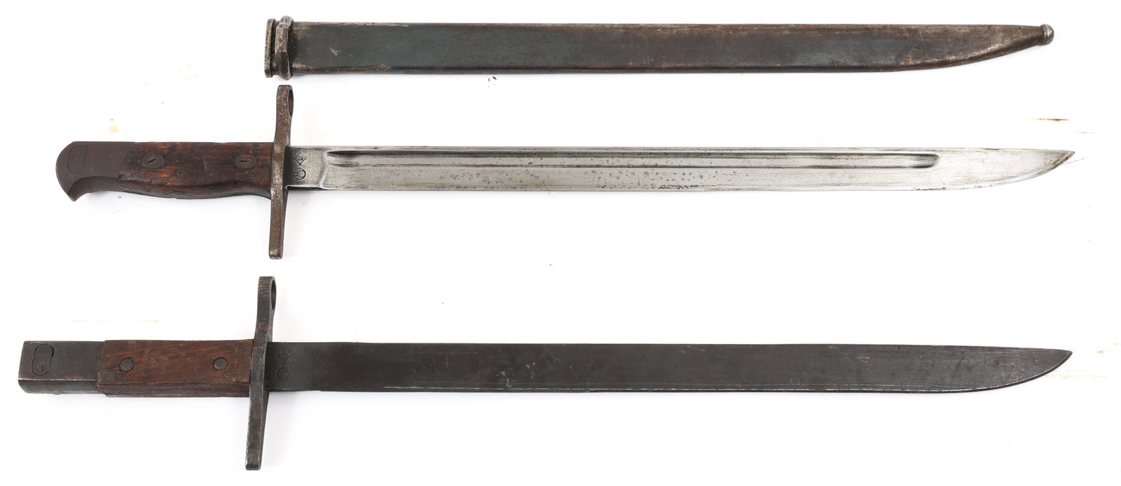 WWII JAPANESE TYPE 30 BAYONET LOT OF 2: WWII JAPANESE TYPE 30 BAYONET LOT OF 2 | Lot of 2 WWII Japanese Bayonets Type 30. (1) WWII Japanese Bayonet Type 30. Straight bright blade with fuller. Maker mark / logo of "Toyada Jido Shokki Seisaku