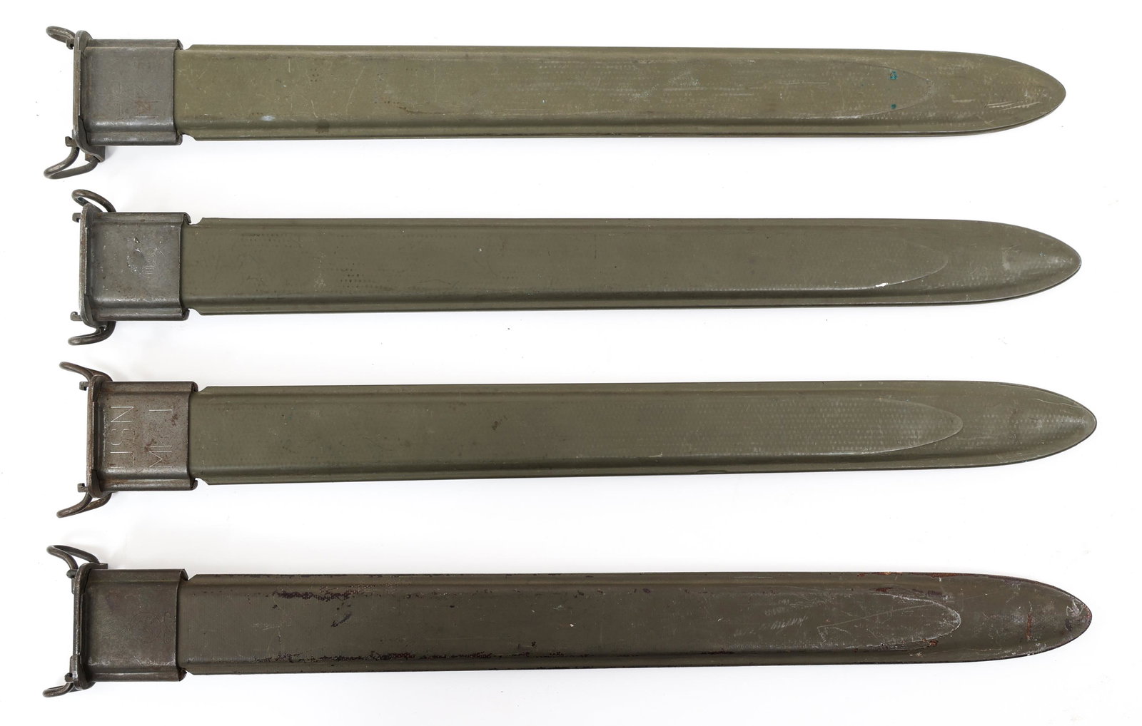 WWII US ARMY 1942 M1& USN MARK I BAYONET SCABBARDS: WWII US ARMY 1942 M1& USN MARK I BAYONET SCABBARDS | Lot of 4 WWII US Army 1942 M1 & USN Mark I long bayonet scabbards. Total Length: 17"