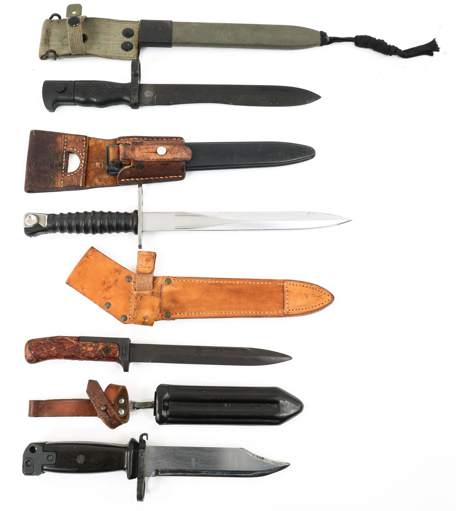 SPANISH - SWISS - CZE & CHINESE BAYONET LOT OF 4: SPANISH - SWISS - CZE & CHINESE BAYONET LOT OF 4 | Lot of 4 World Bayonets. (1) 9.3/4" blade, Spanish MCETME 69 bayonet & scabbard. Maker's mark & logo stamped on both sides of the ricasso. (1) 9.1/4"