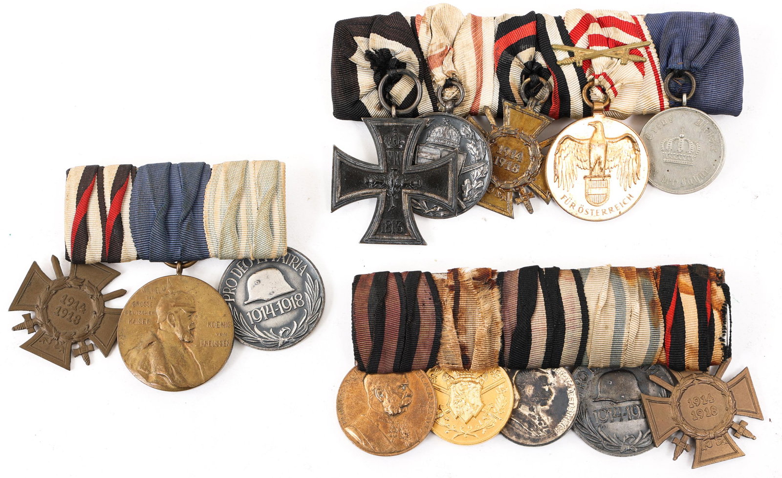 WWI IMPERIAL GERMAN MOUNTED MEDAL BAR LOT OF 3: WWI IMPERIAL GERMAN MOUNTED MEDAL BAR LOT OF 3 | Lot of 3 WWI Imperial German Mounted Medal bars. (1) WWI Veteran's group of 5 Medals; Iron Cross 2nd Class; Hungary (Kingdom) Commemorative Medal; Hind