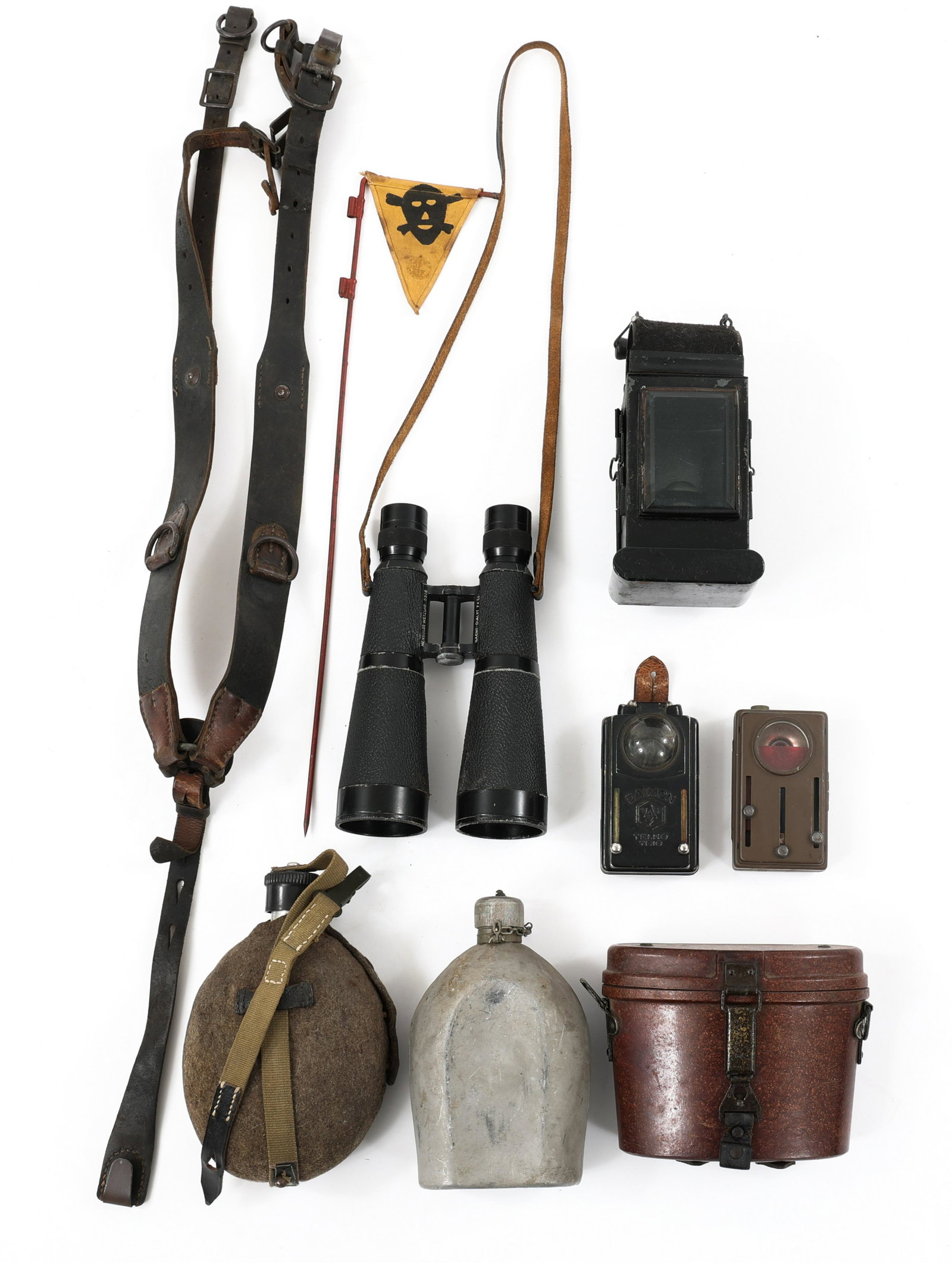WWII GERMAN BINOCULARS AND FIELD GEAR LOT: WWII GERMAN BINOCULARS AND FIELD GEAR LOT | WWII German Binoculars and field Gear lot. Includes Binoculars; Combat Y strap; Canteens, Flashlights; Lantern; Mine signal stick; Bakelite field binoculars
