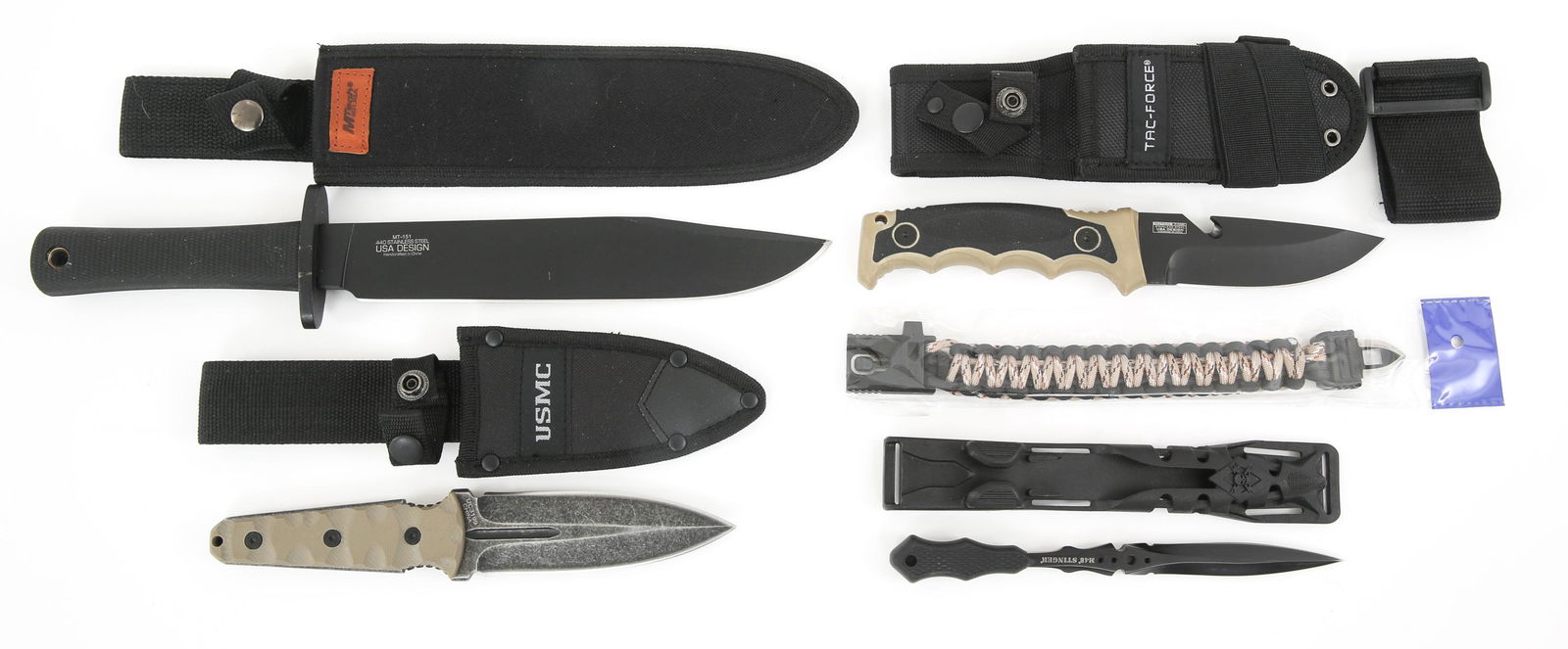 M-TECH & UNITED CUTLERY SHEATH KNIVES LOT OF 4: M-TECH & UNITED CUTLERY SHEATH KNIVES LOT OF 4 M-Tech USA & United Cutlery Sheath Knives. Lot of 4. (1) UC 'M48 Stinger' dagger. (1) UC USMC 'Scorching Sands' dagger. G10 handle. (1) M-Tech USA MT-151