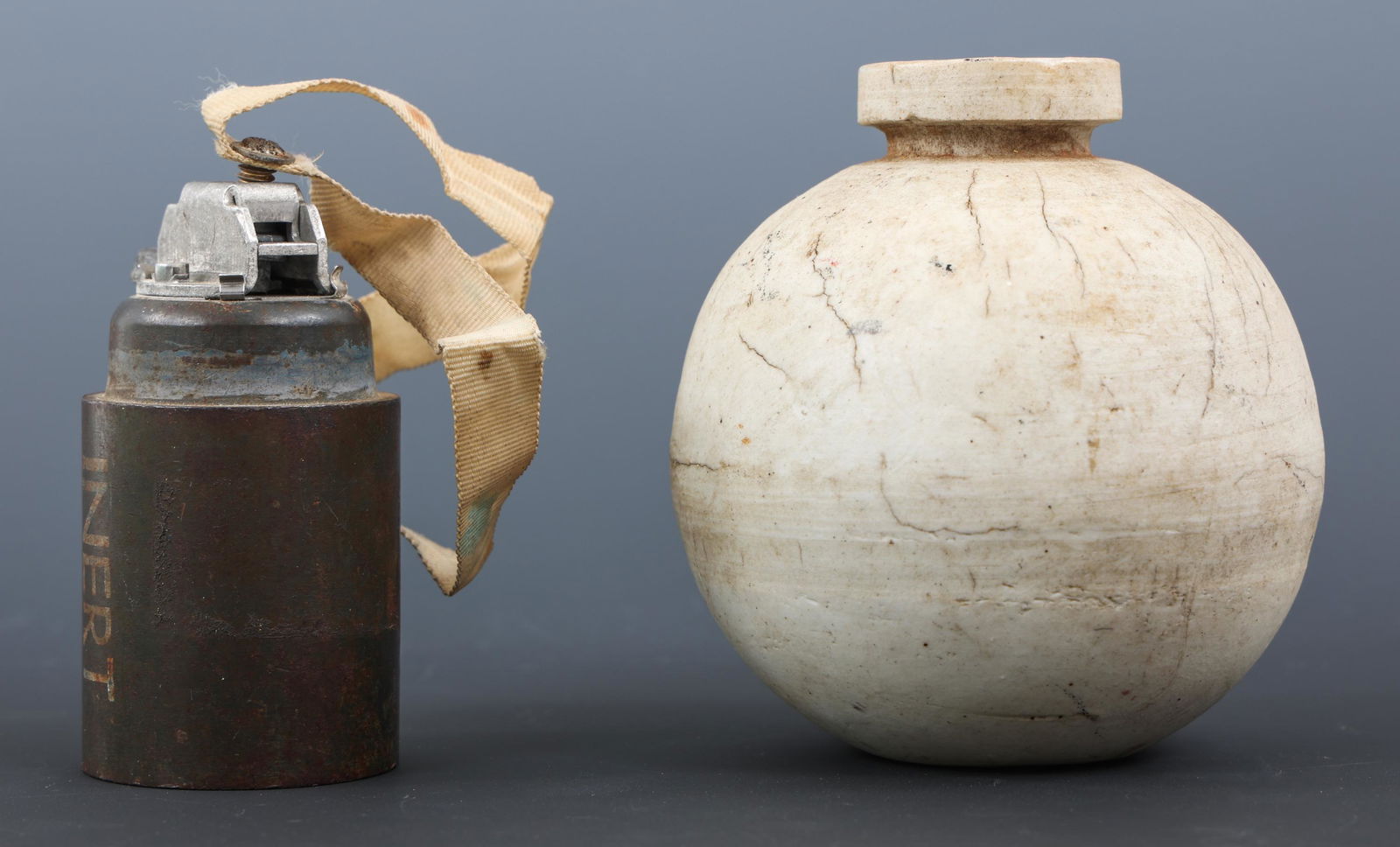 WWII JAPANESE GRENADE TYPE 4 & M77 CLUSTER BOMB: WWII JAPANESE GRENADE TYPE 4 & M77 CLUSTER BOMB Lot of 2 Ordnance. (1) WWII Japanese Ceramic hand grenade Type 4. Inert. (1) M77 Cluster Bomb. Inert.