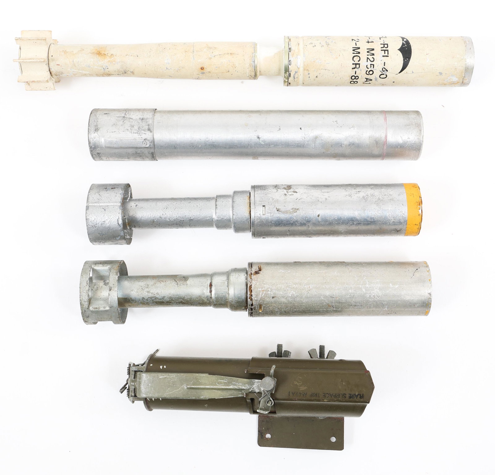 COLD WAR US MILITARY FLARES & SMOKE MORTARS: COLD WAR US MILITARY FLARES & SMOKE MORTARS (1) US M259A1 Parachute Flare, inert. (1) M49A1 Surface Trip Flare. (1) M21A1 Amber Star Signal Parachute, inert, dated 1944. (1) M-64 Yellow Ground Smoke S