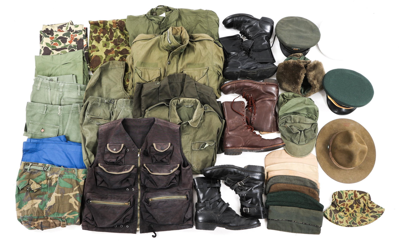 COLD WAR US ARMY & USMC UNIFORM ITEMS MIXED LOT: COLD WAR US ARMY & USMC UNIFORM ITEMS MIXED LOT Large lot of Cold War US Army & USMC uniform items including boots, garrison caps, tactical vest, and more. Size: Various