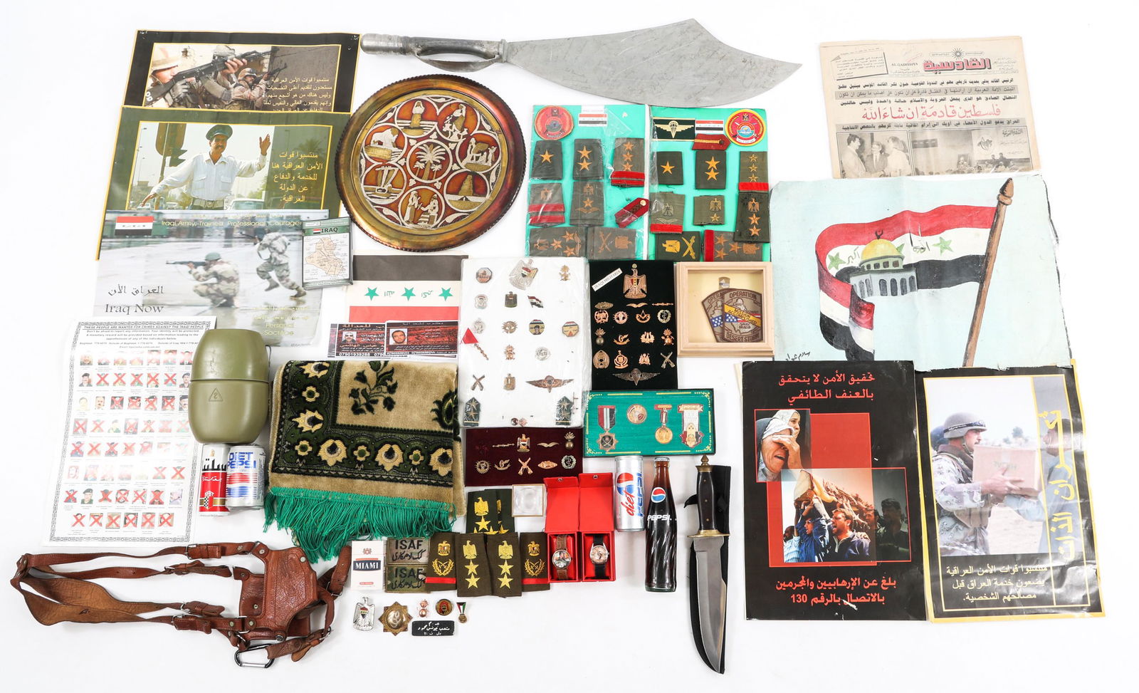 GULF WAR IRAQI MILITARY RANKS & INSIGNIA'S & MORE: GULF WAR IRAQI MILITARY RANKS & INSIGNIA'S & MORE Mixed lot of Iraqi Army ranks and insignia's and other items from Iraq including:(1) US Army platoon custom engraved signature Scimitar sword, 36 inch