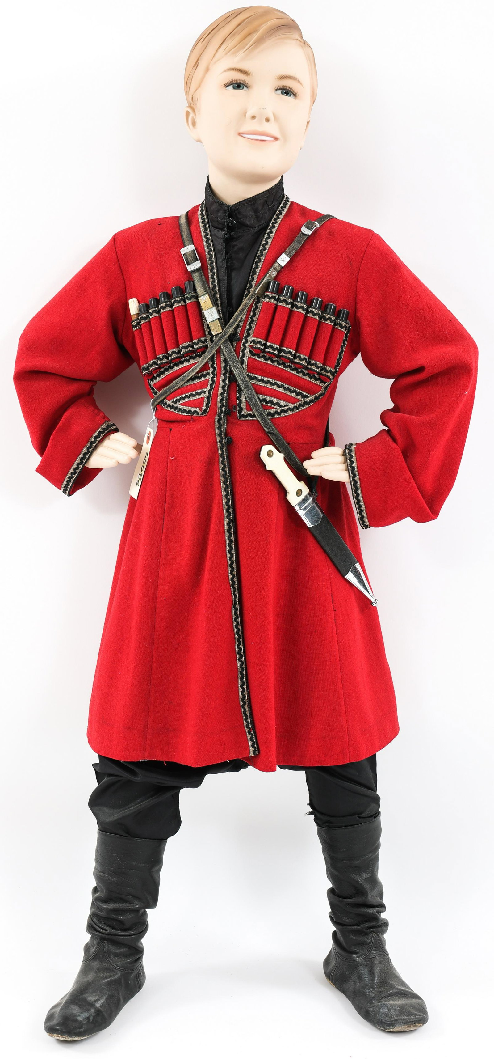 RUSSIAN COSSACK CHILD MANNEQUIN DRESS UNIFORM: RUSSIAN COSSACK CHILD MANNEQUIN DRESS UNIFORM A complete Russian Cossack Child Mannequin Dress Uniform circa 1930's - 1940's. Including Red wool cherkeska with silver bullion thread & black braiding; 