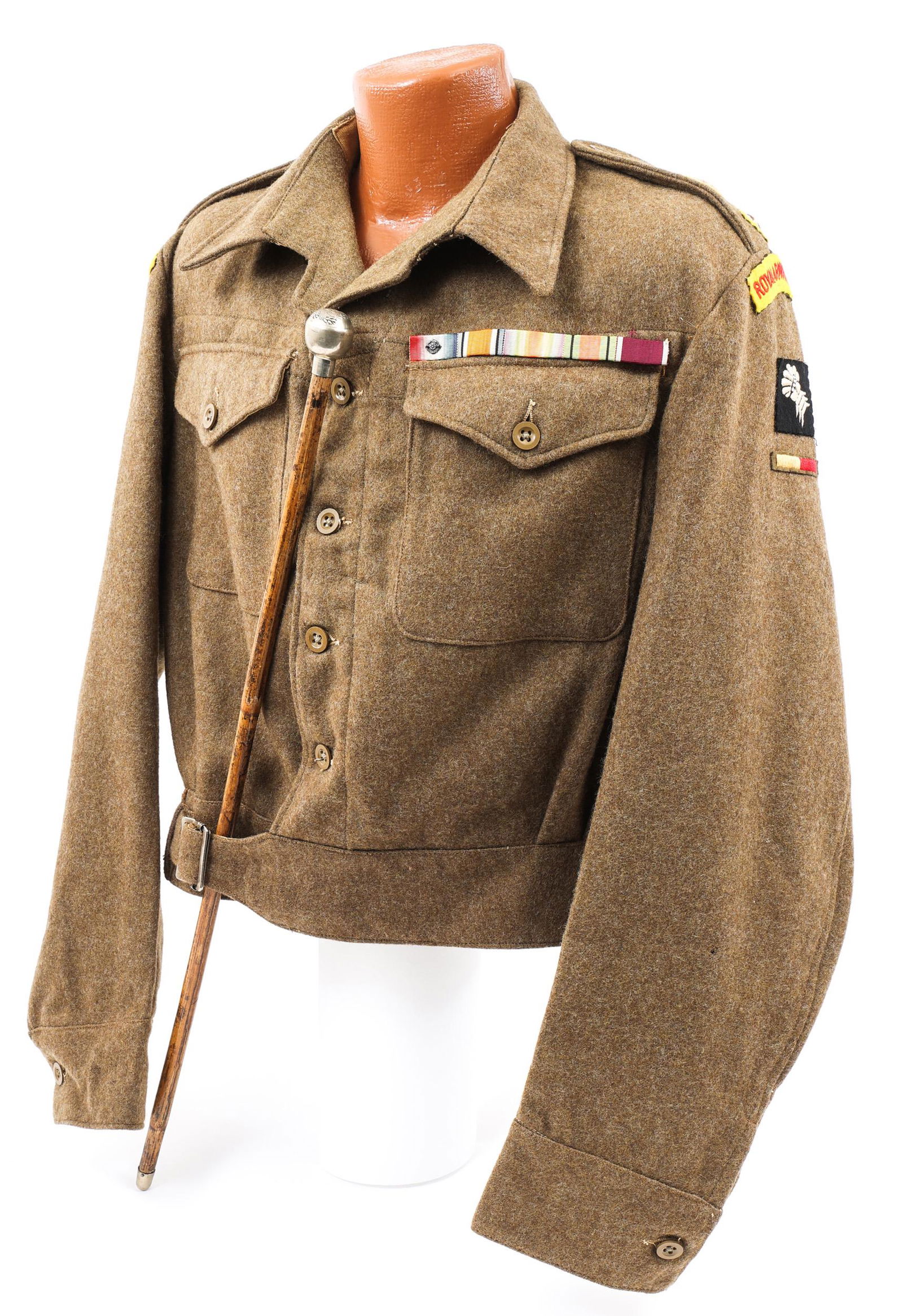 WWII BRITISH ARMY OFFICER TANKER BATTLEDRESS TUNIC: WWII BRITISH ARMY OFFICER TANKER BATTLEDRESS TUNIC WWII British Army, M1940 Battledress Tunic & Swagger Stick of 6th Armored Division Lieutenant. Complete with patches and ribbon bar. Qmt. tag present