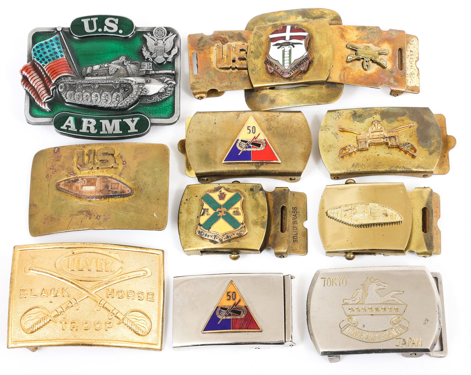 US ARMY ARMORED CORPS & CAVALRY CUSTOM BELTS: US ARMY ARMORED CORPS & CAVALRY CUSTOM BELTS Mixed lot of 10 US Army Cavalry & Tank Corps Custom Belt Buckles.