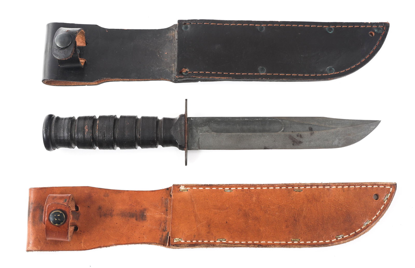 VIETNAM WAR US NAVY MARK II KA-BAR By CAMILLIUS: VIETNAM WAR US NAVY MARK II KA-BAR By CAMILLIUS Vietnam War era US Navy Mark II KA-BAR. Straight, parkerized blade with fuller. "US Camillus NY" stamped on ricasso. Stacked leather handle. Black and b