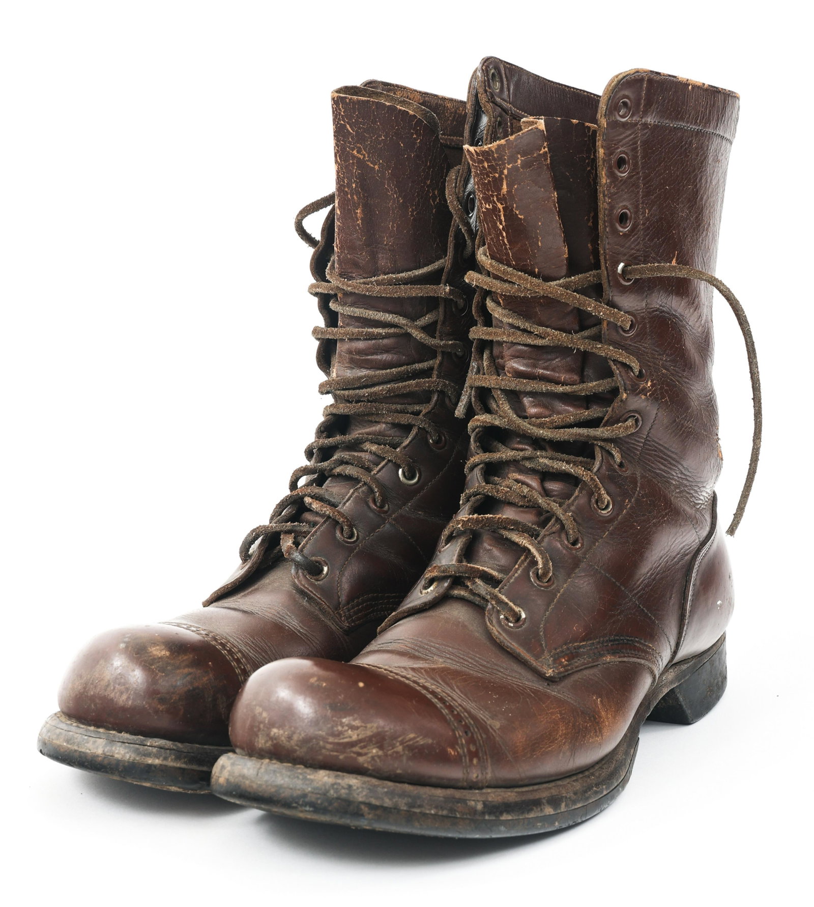 WWII US ARMY PARATROOPER JUMP BOOTS: WWII US ARMY PARATROOPER JUMP BOOTS WWII US Army Paratrooper Jump Boots. Brown leather construction, reinforced stitching on the sides, 12 eyelets with leather laces. Mfg. stamping faded on the inside