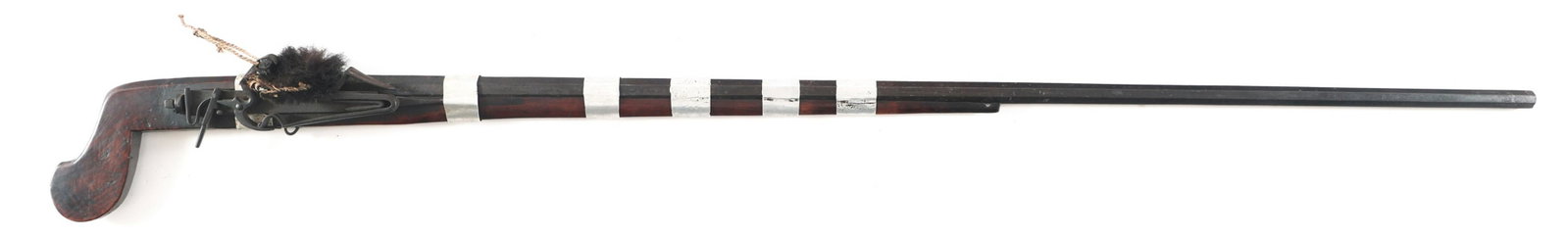SOUTHEAST ASIAN .45 CALIBER ARQUEBUS: SOUTHEAST ASIAN .45 CALIBER ARQUEBUS Southeast Asian .45 caliber flintlock Arquebus. Smooth bore, octagonal 33.50" barrel. Hook form, hardwood handle. White metal barrel bands. | Caliber / Gauge: 45 |