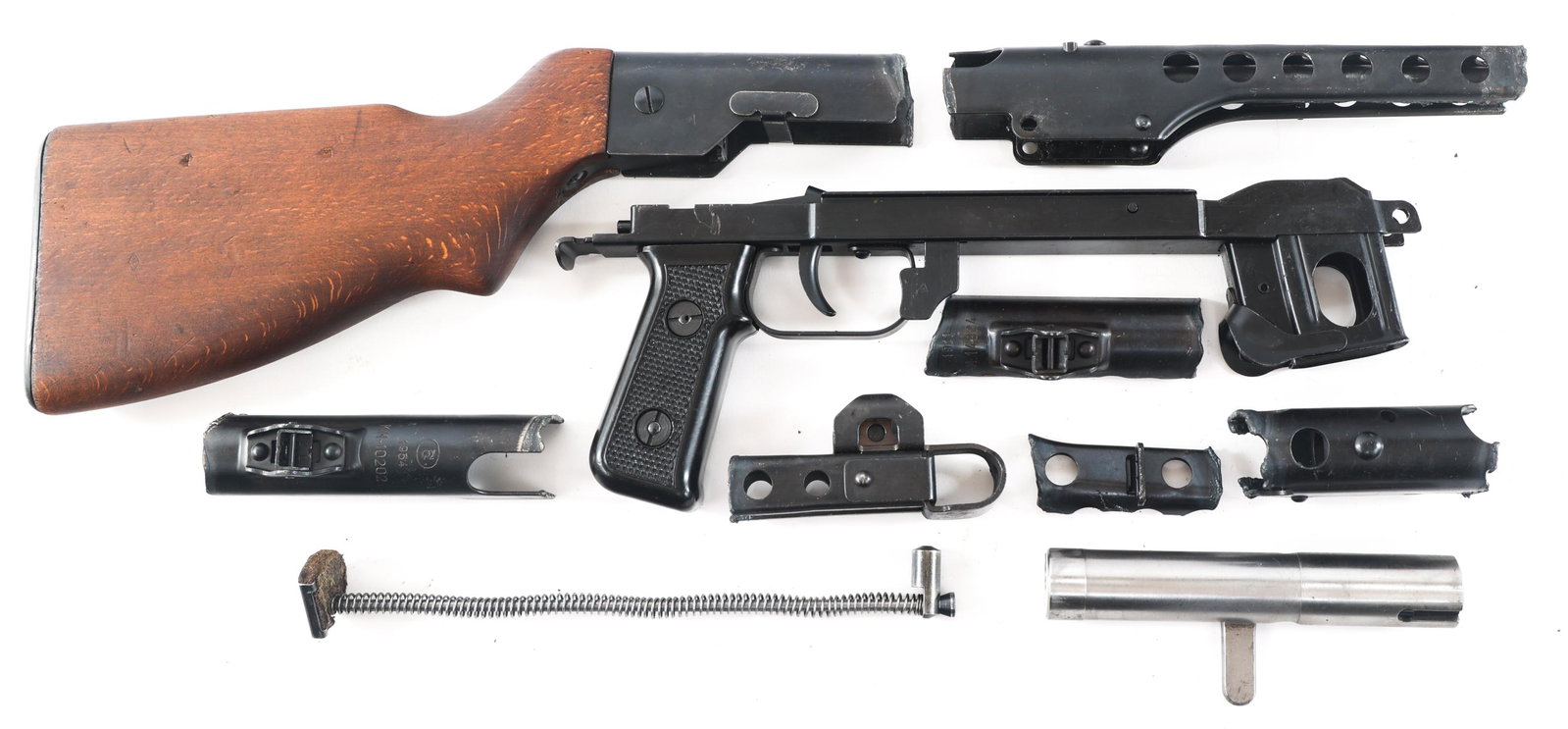 1954 POLISH LUCZNIK PPS43 SUBMACHINE GUN PARTS KIT: 1954 POLISH LUCZNIK PPS43 SUBMACHINE GUN PARTS KIT Demilled 1954 Polish Lucznik PPS-43 7.62x25mm caliber submachine gun parts kit. Lower receiver with grip, trigger assembly and magazine well. Barrel 