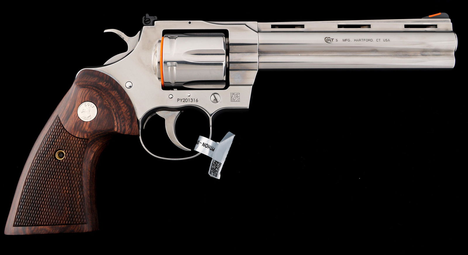 COLT MODEL PYTHON .357 MAGNUM CALIBER DA REVOLVER: COLT MODEL PYTHON .357 MAGNUM CALIBER DA REVOLVER Colt Model Python .357 Magnum caliber double action revolver. Polished finish. Red ramp front sight. Adjustable rear sight. Checkered walnut grips. Or